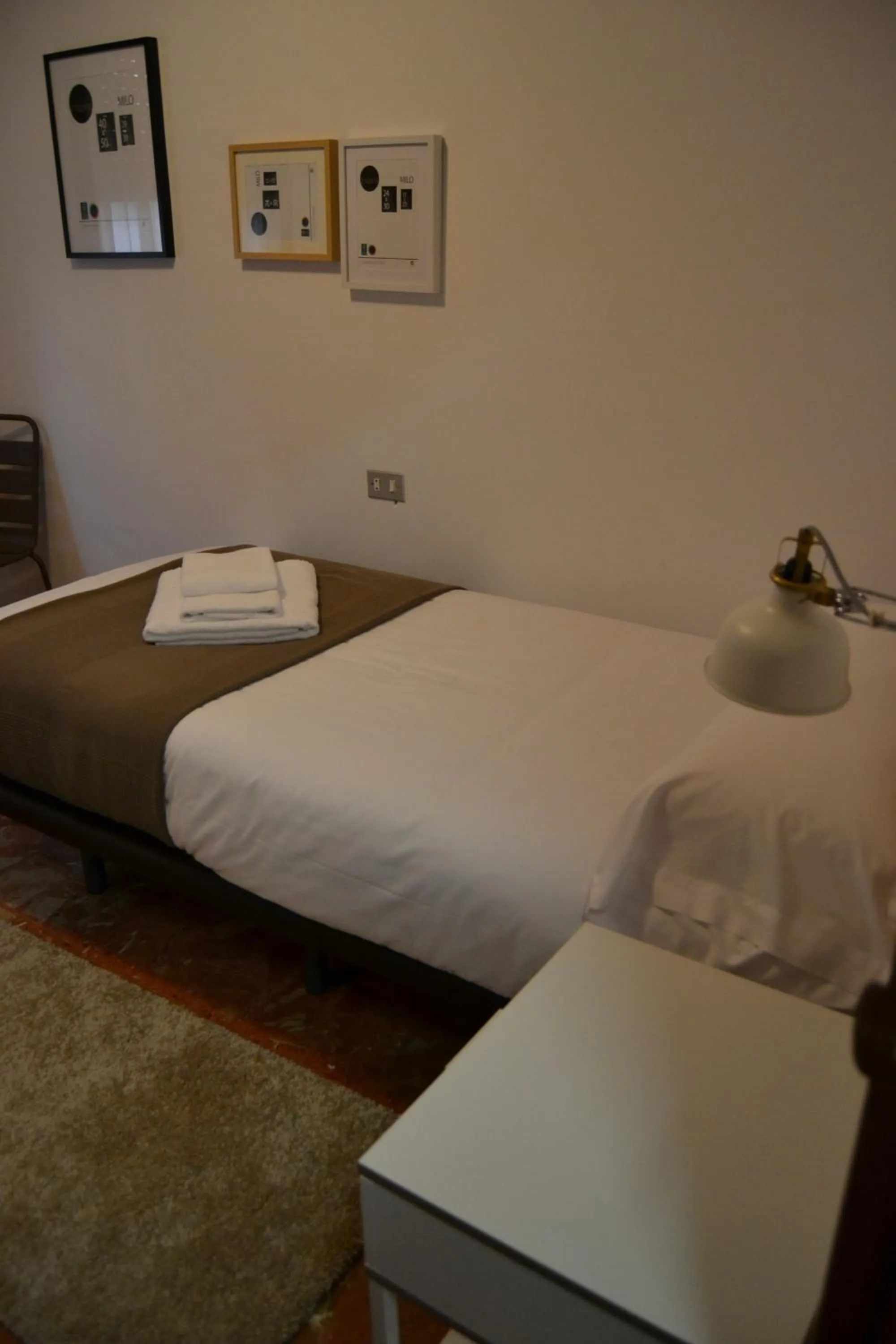 Photo of the whole room, Bed in Tres Puentes Anguiano Apartamentos y Hostal