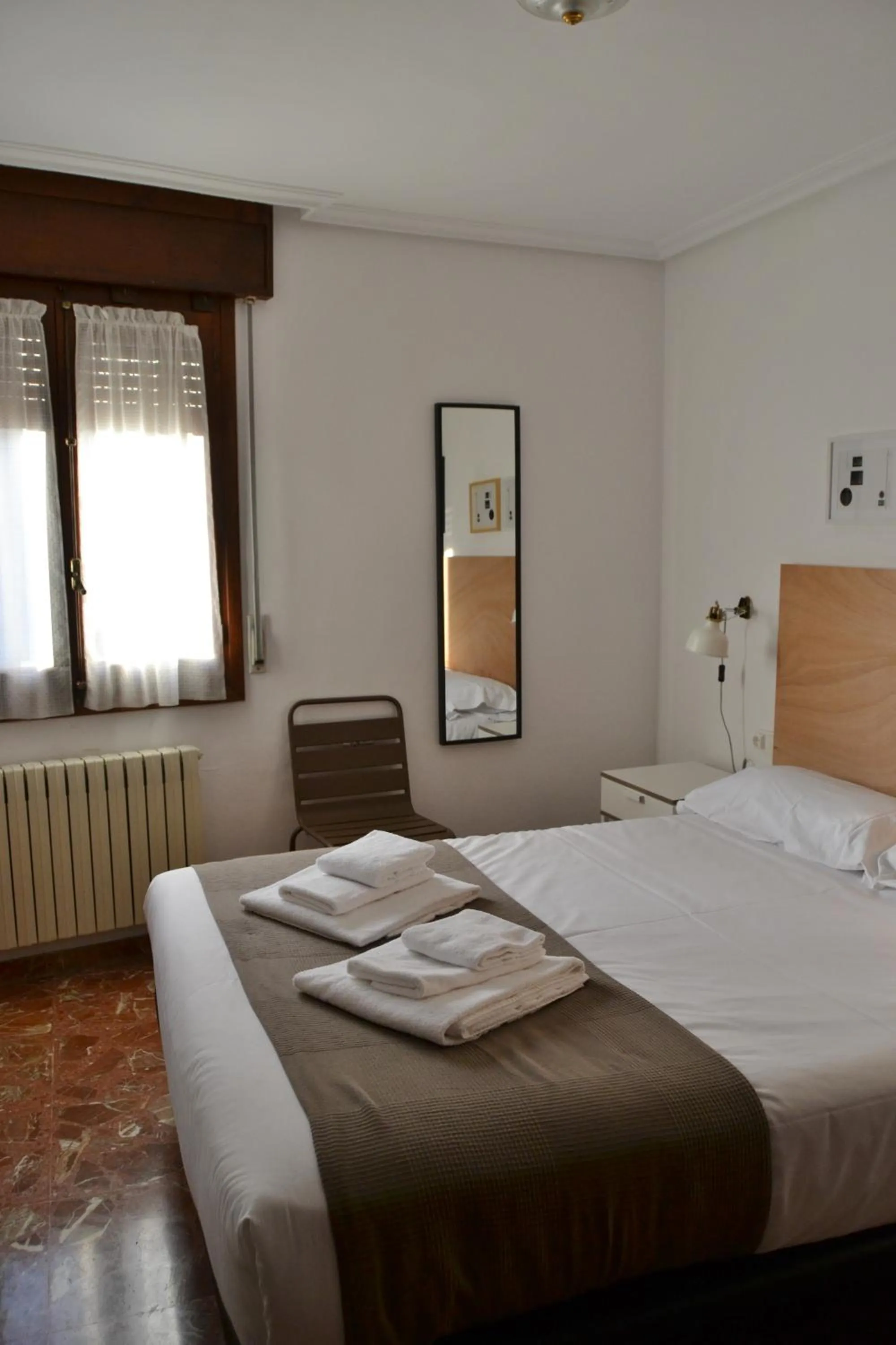 Photo of the whole room, Bed in Tres Puentes Anguiano Apartamentos y Hostal