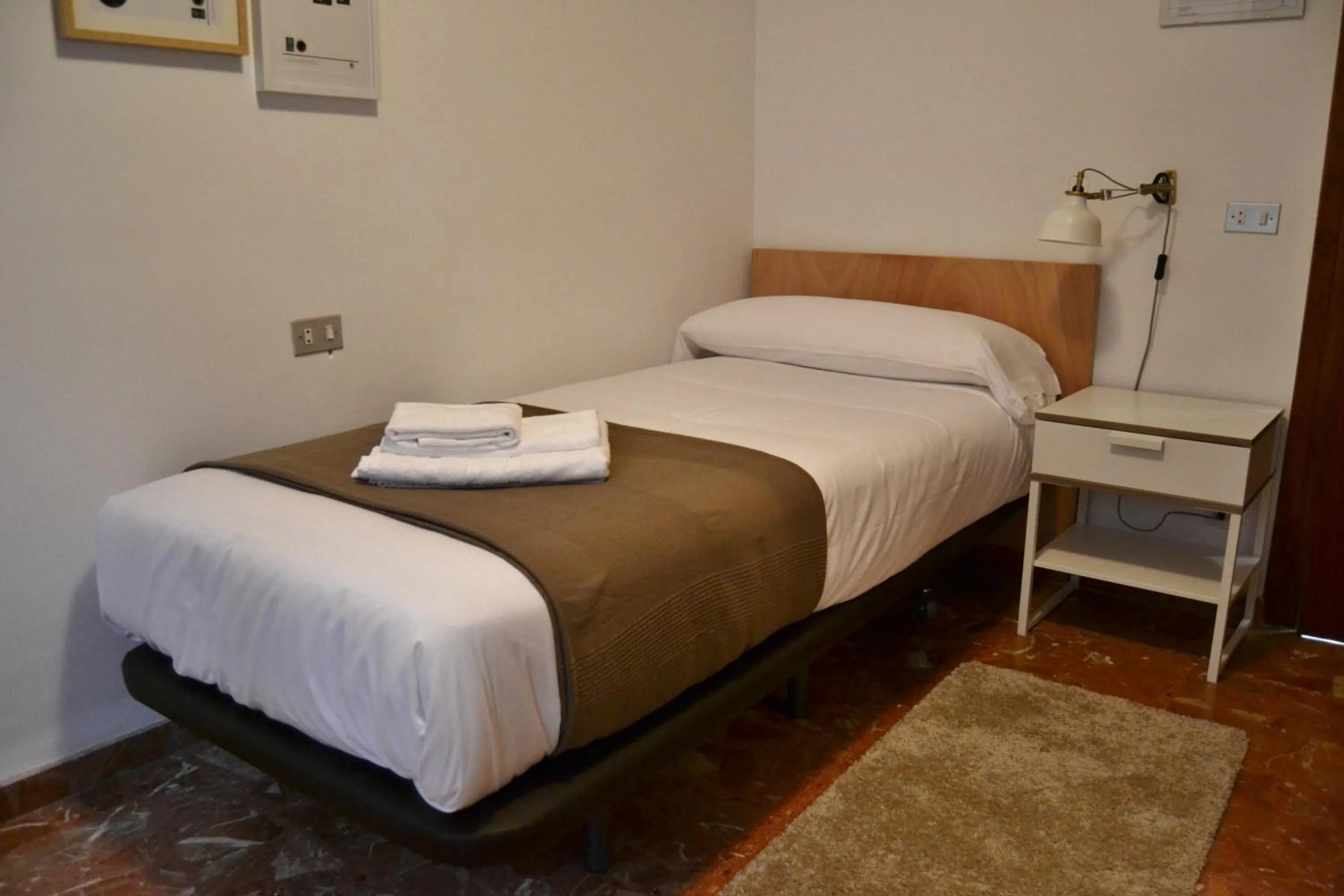 Photo of the whole room, Bed in Tres Puentes Anguiano Apartamentos y Hostal