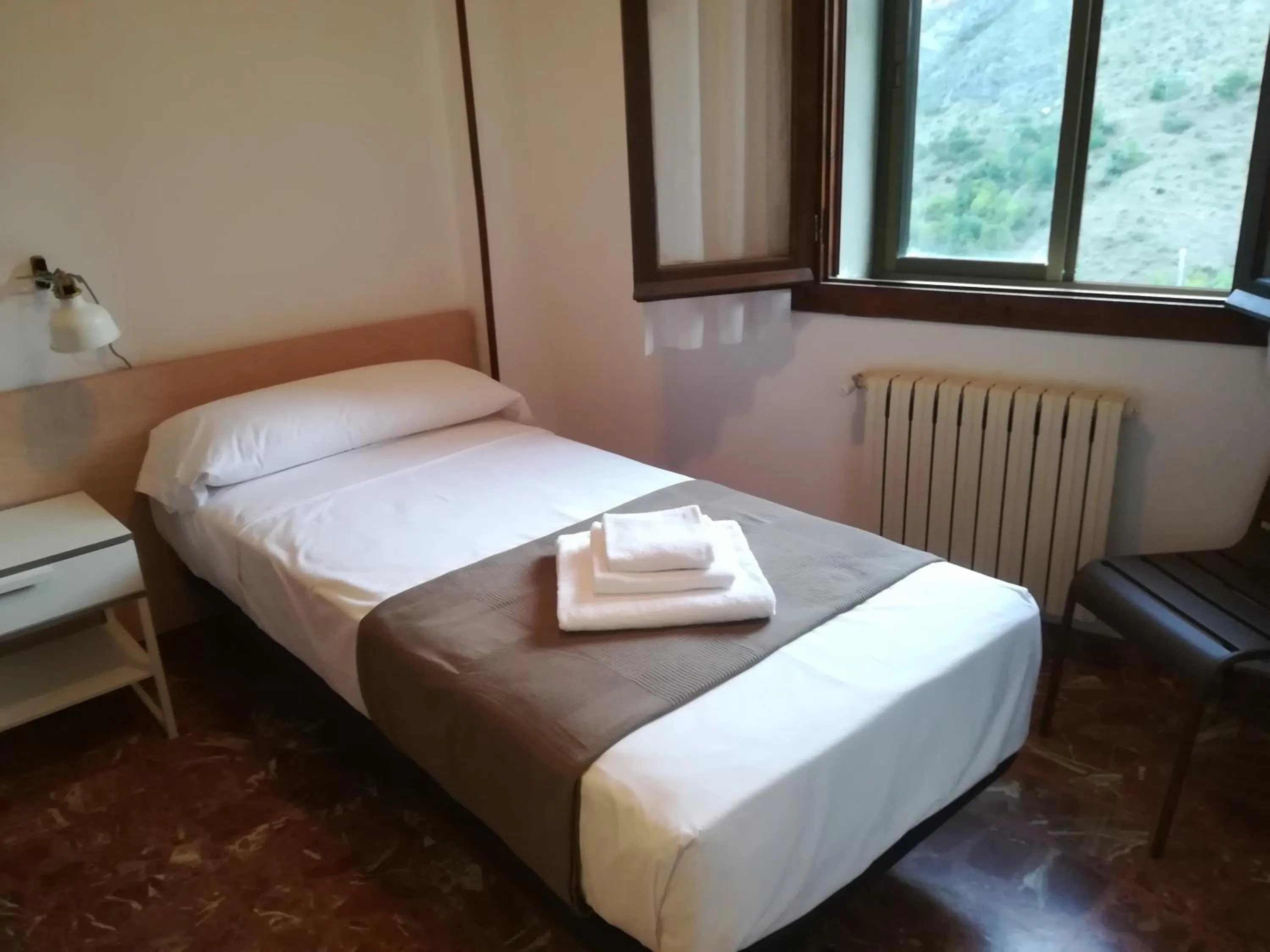 Bed in Tres Puentes Anguiano Apartamentos y Hostal