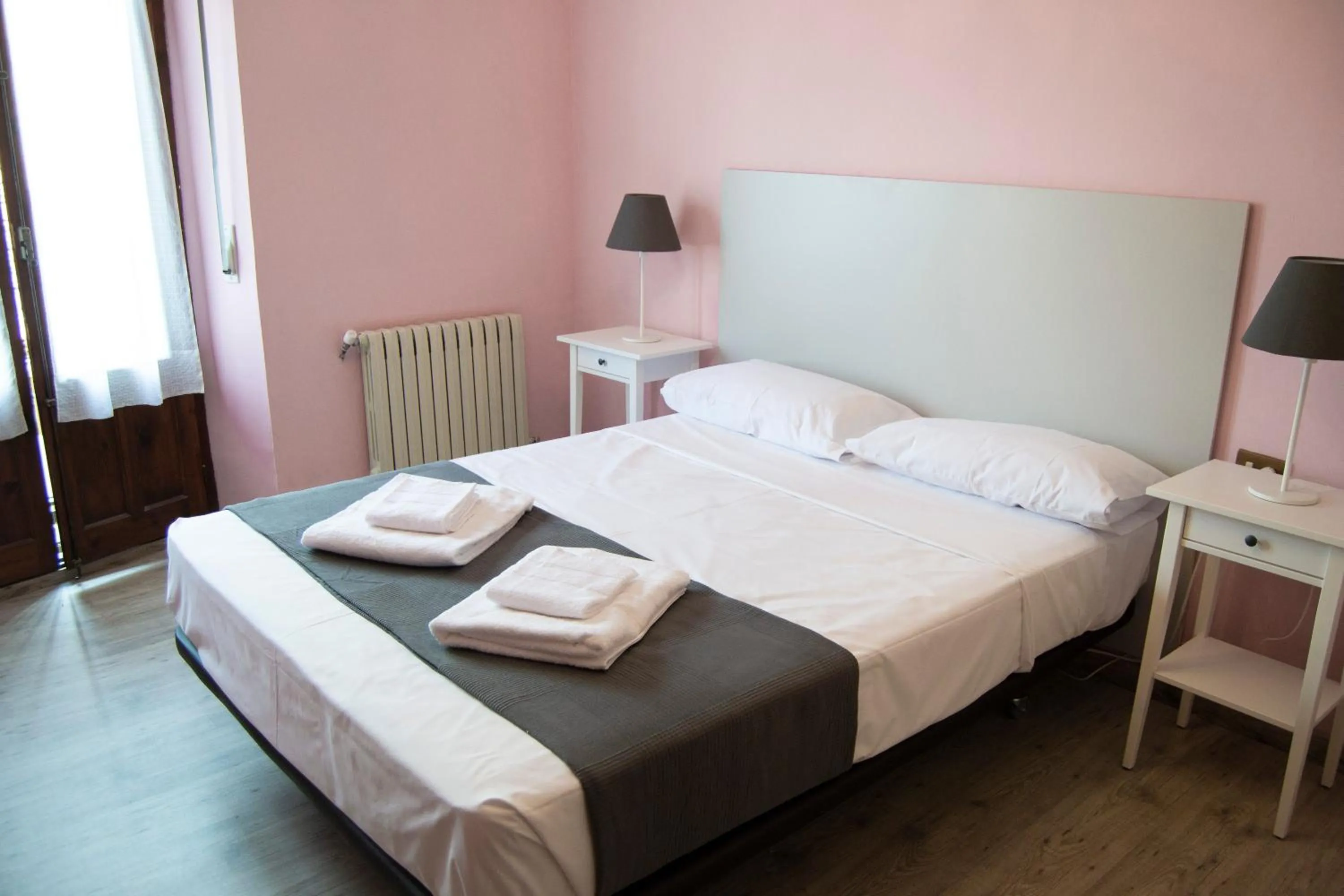 Photo of the whole room, Bed in Tres Puentes Anguiano Apartamentos y Hostal