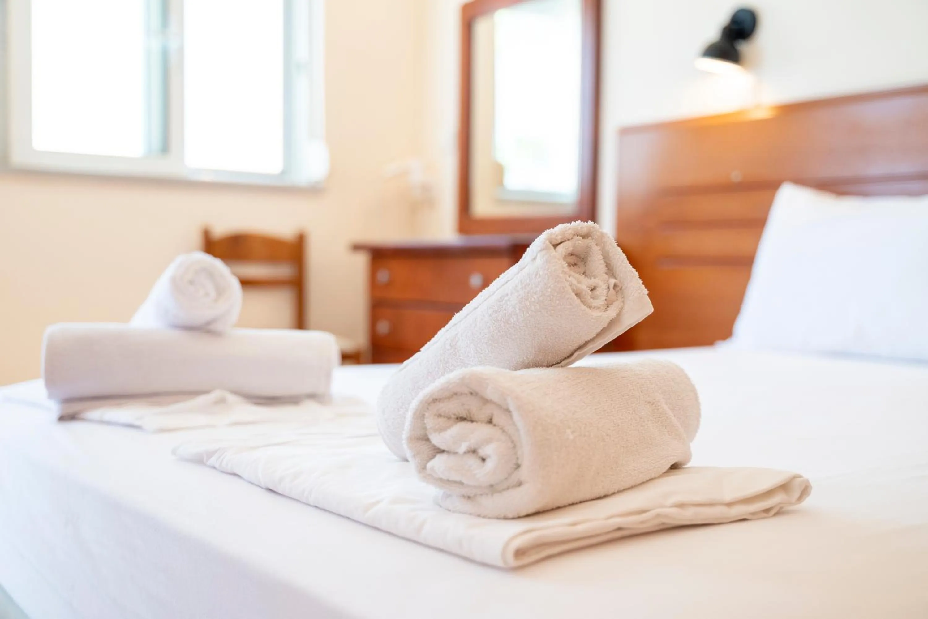 Bed in Mammis Beach Hotel