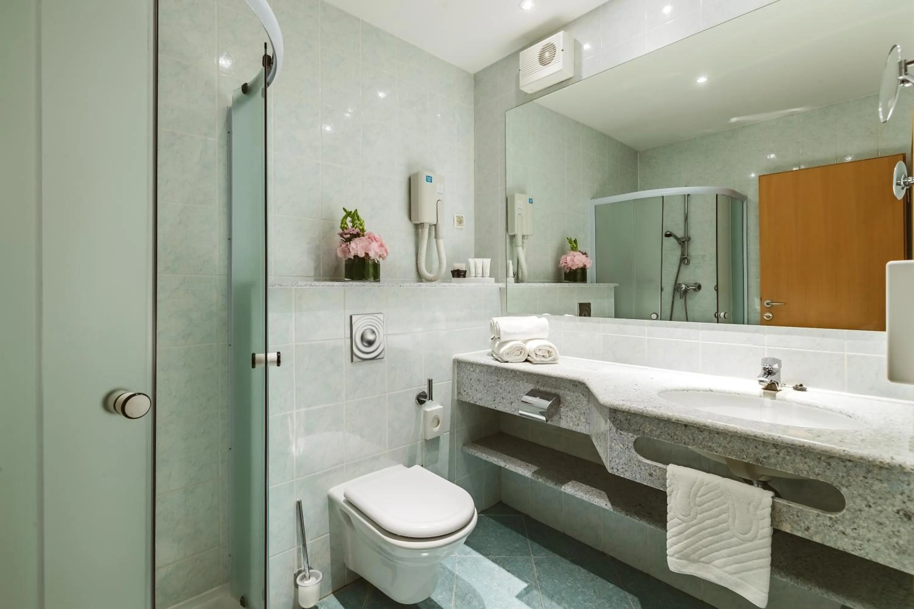 Shower in Ramada Hotel & Suites Kranjska Gora