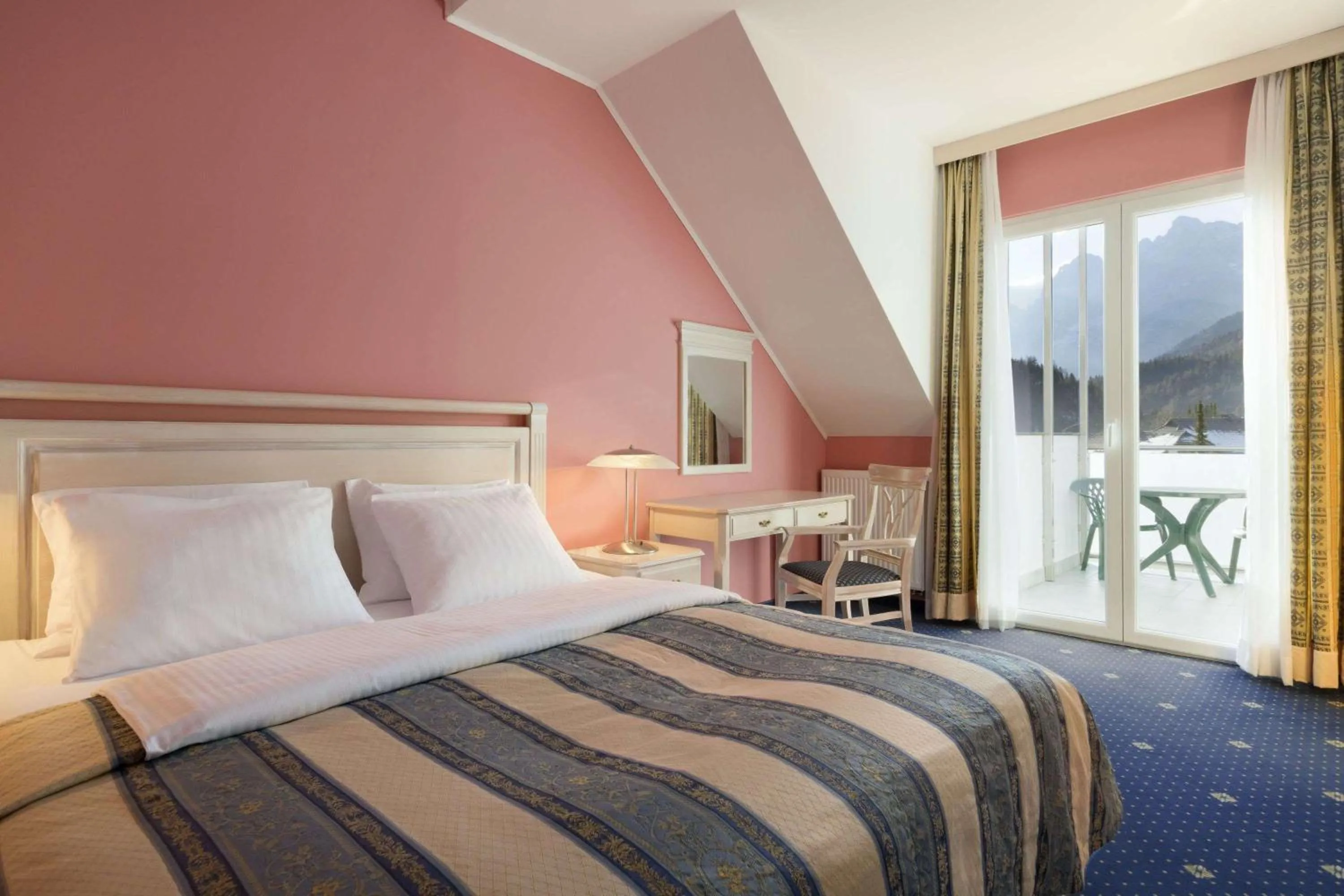 Photo of the whole room, Bed in Ramada Hotel & Suites Kranjska Gora