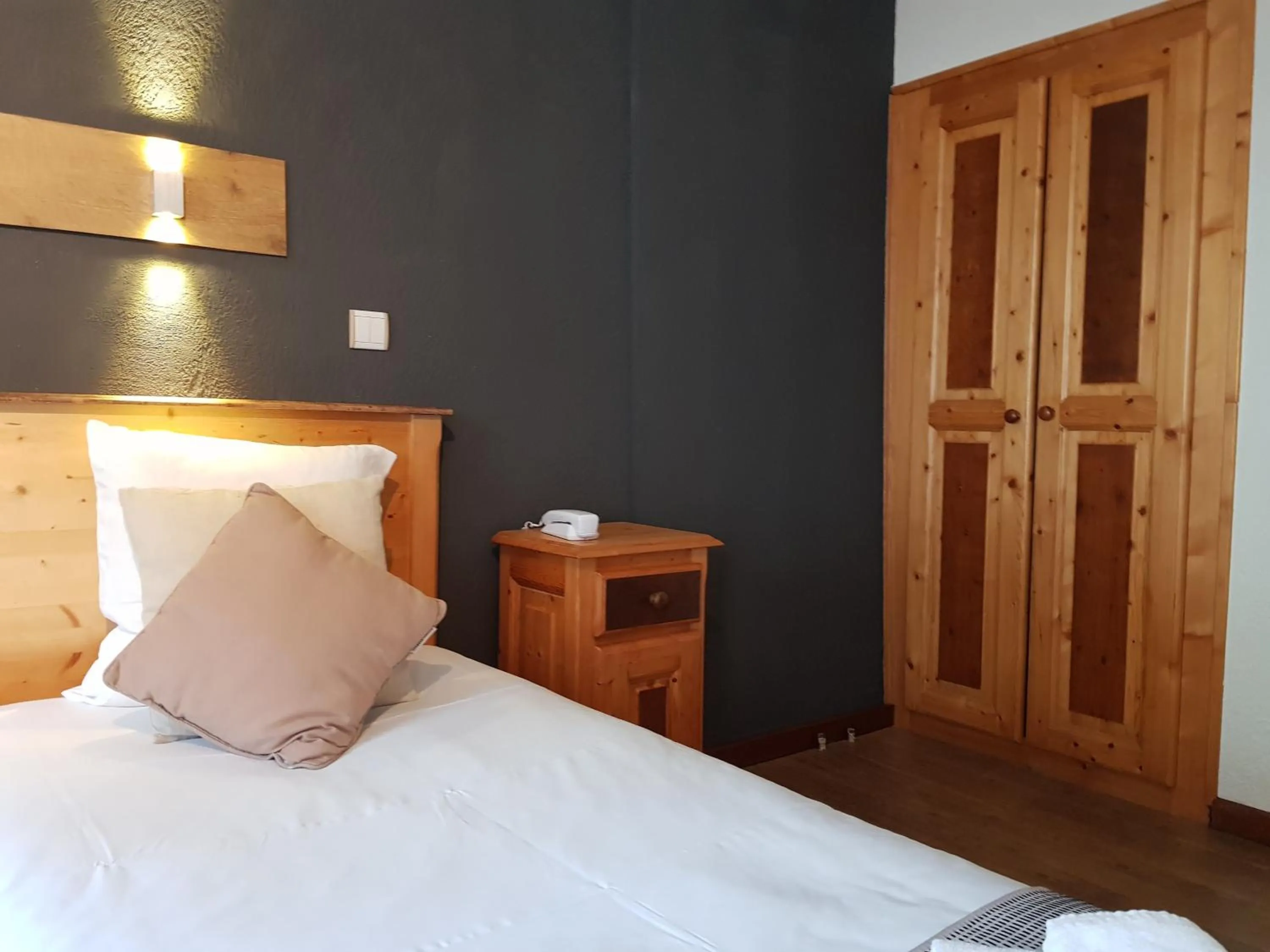 Bed in Savoy Hotel & Restaurant