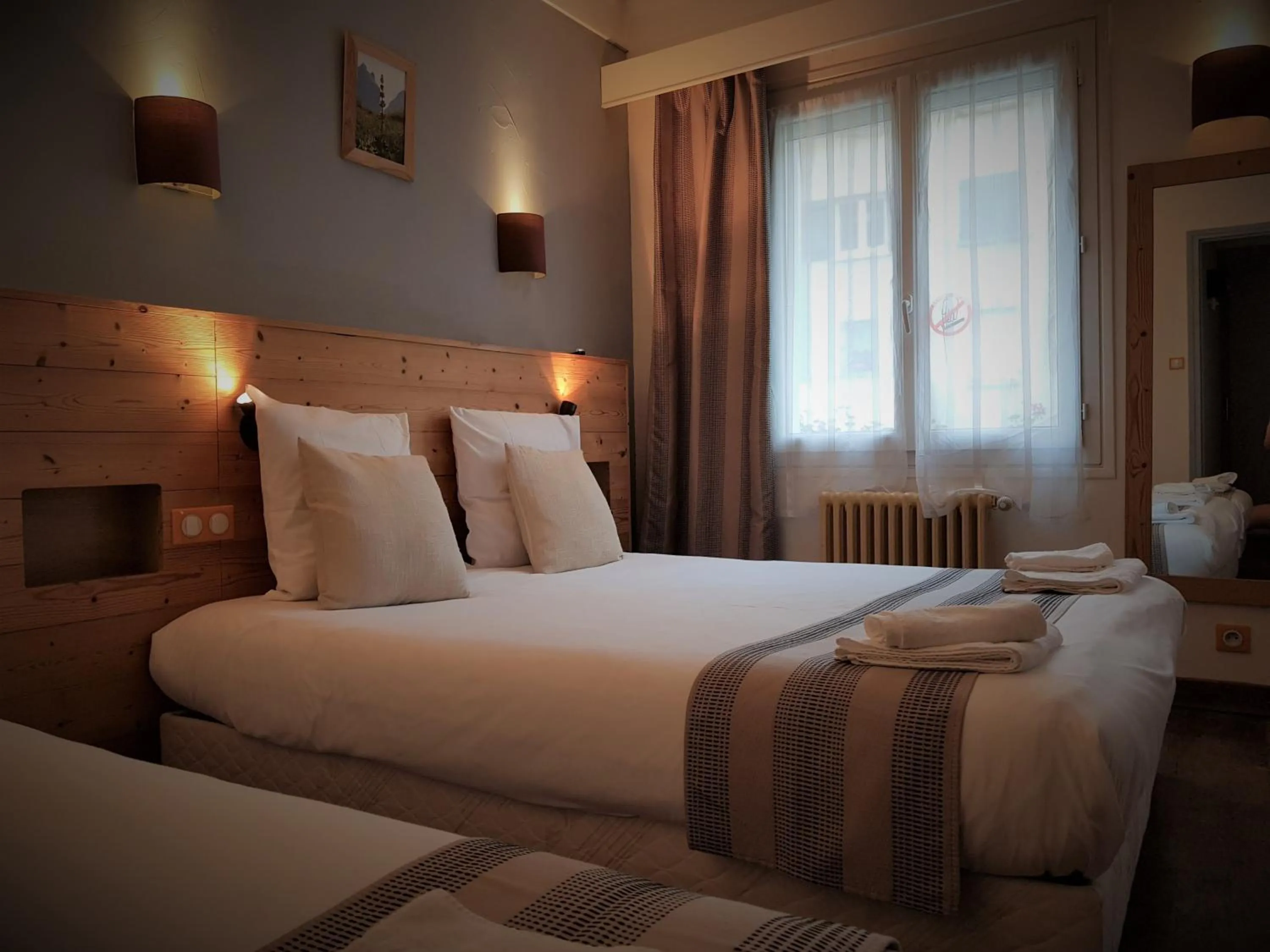 Bed in Savoy Hotel & Restaurant