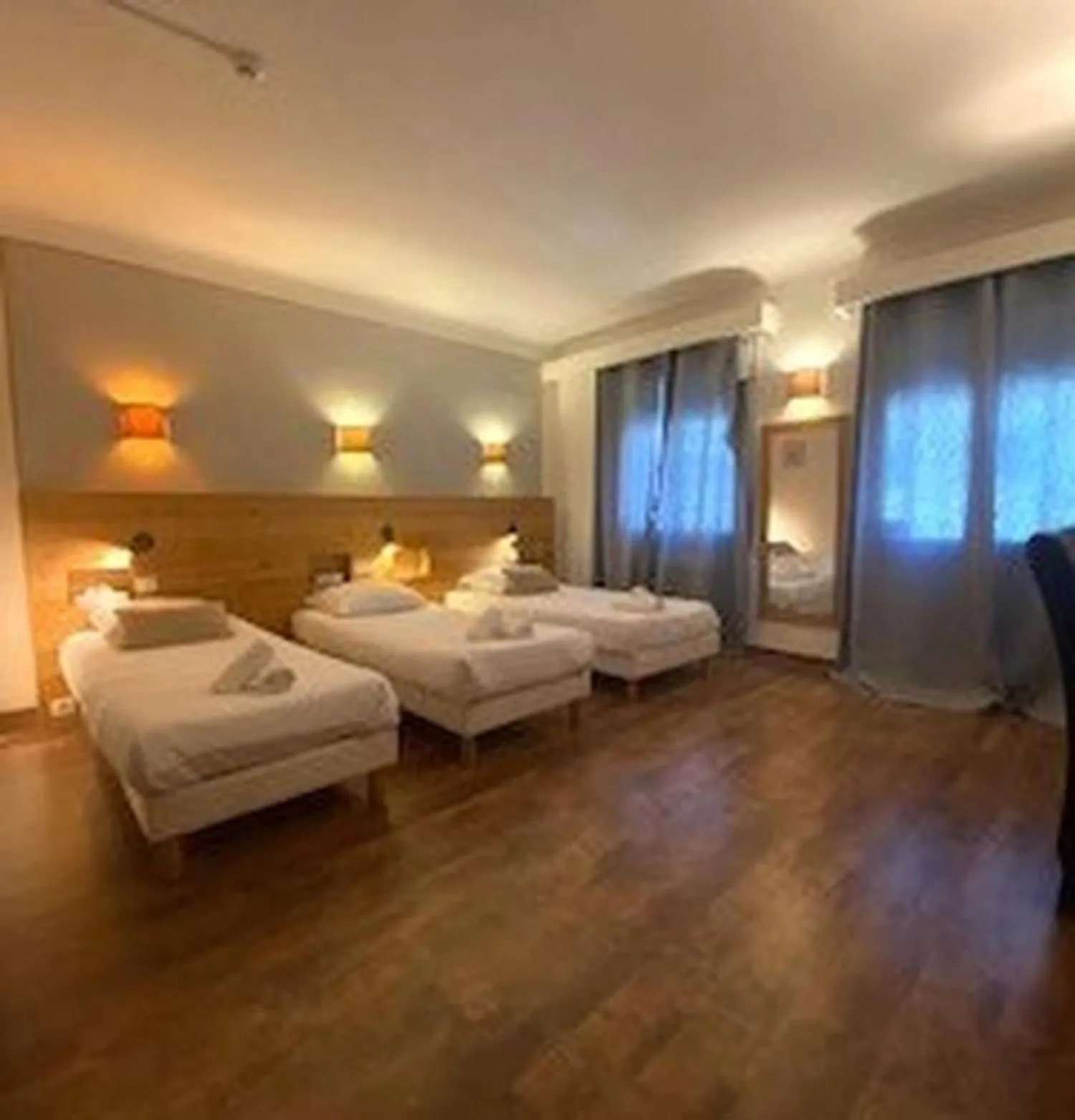 Bed in Savoy Hotel & Restaurant