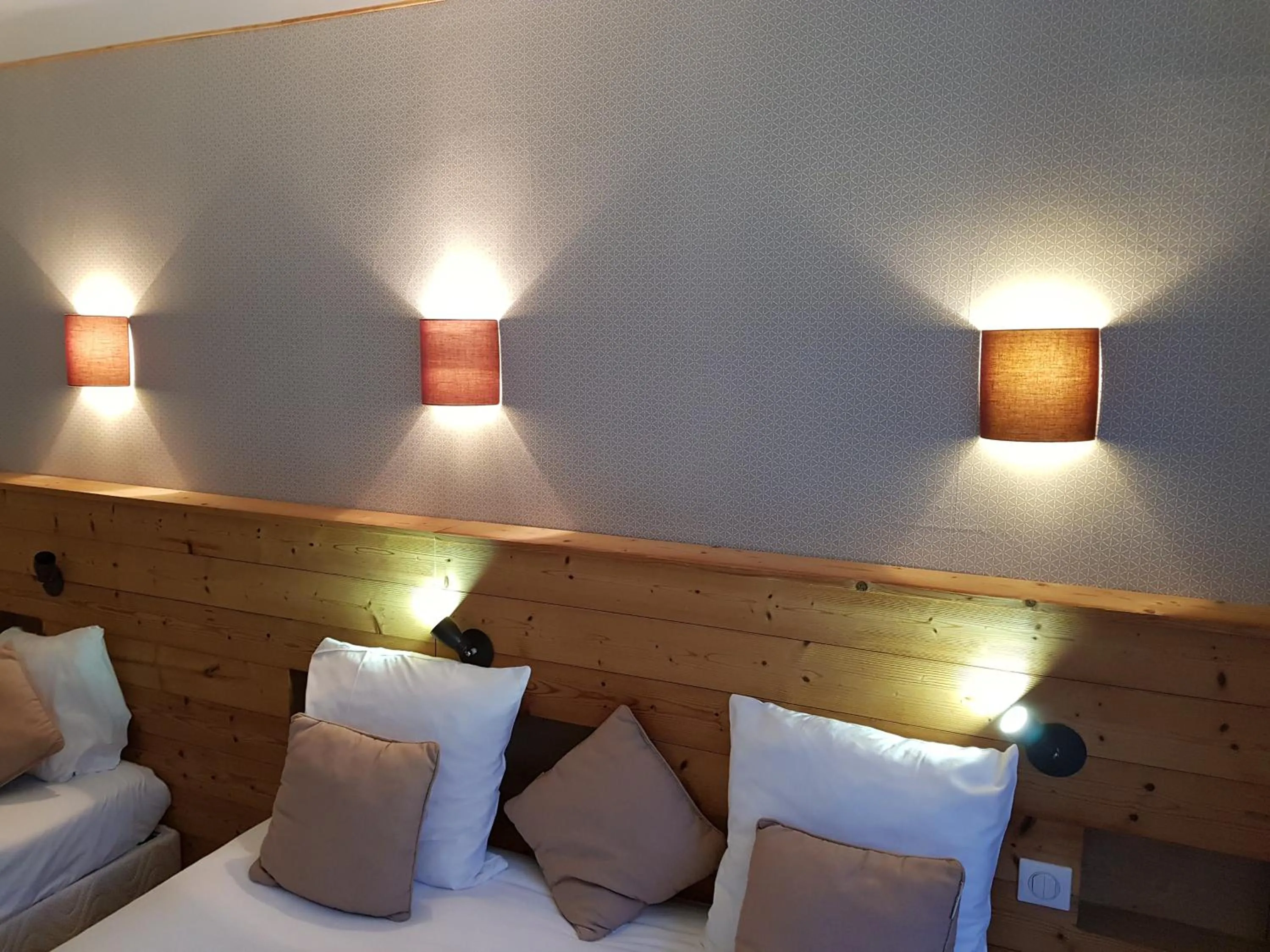 Bed in Savoy Hotel & Restaurant