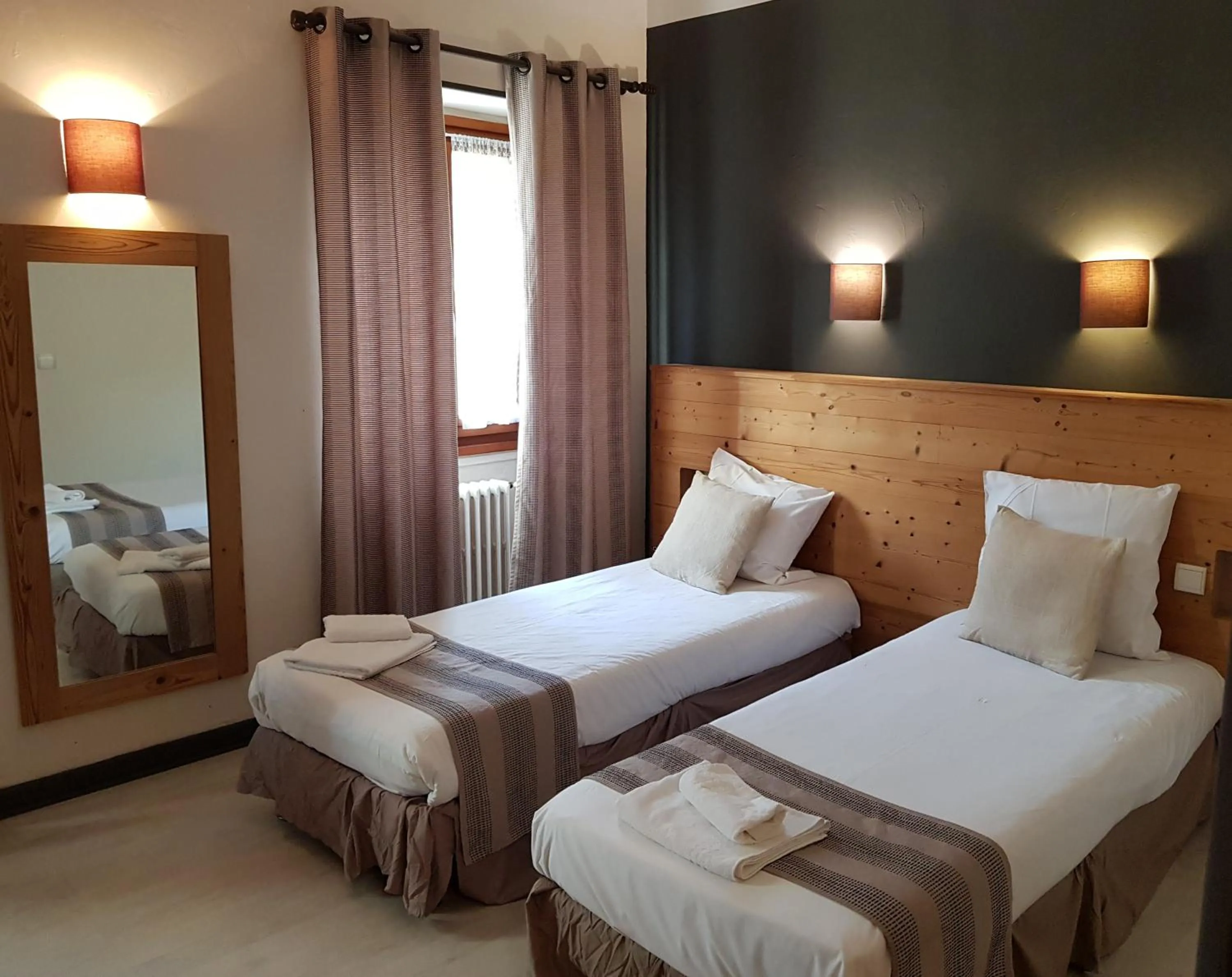 Bed in Savoy Hotel & Restaurant