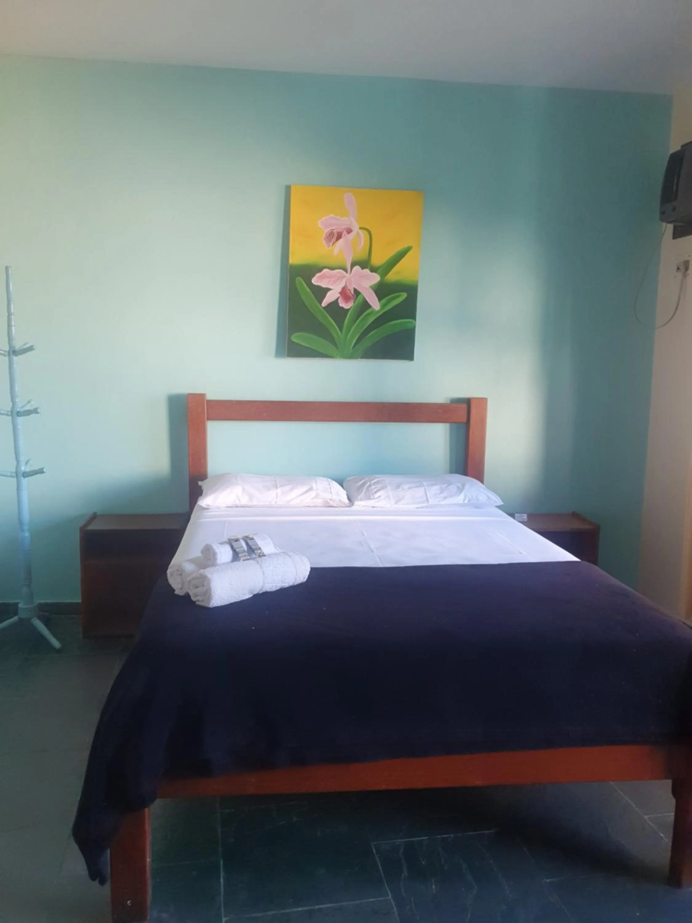 Bed in Pousada Cavalo Marinho