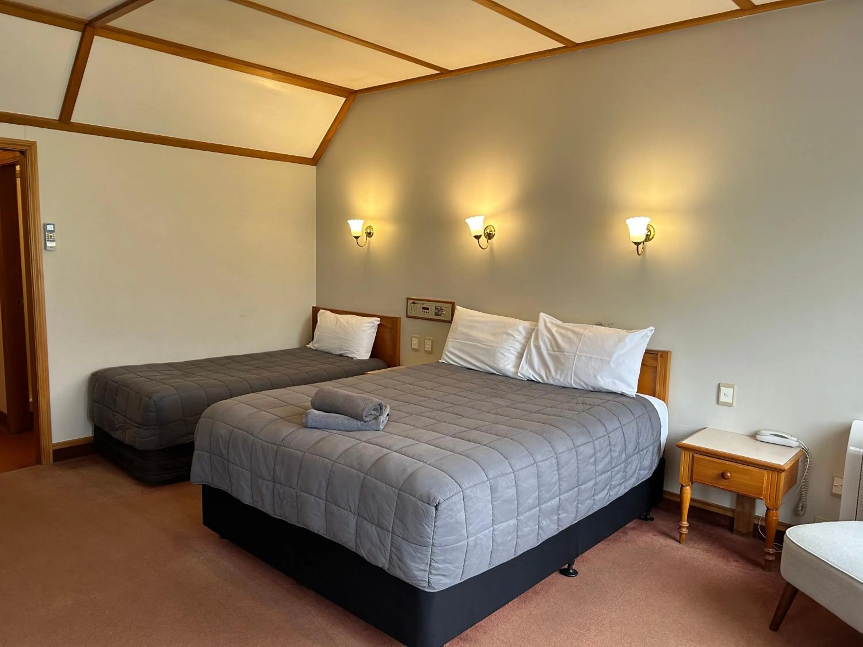 Bed in Masterton Motor Lodge