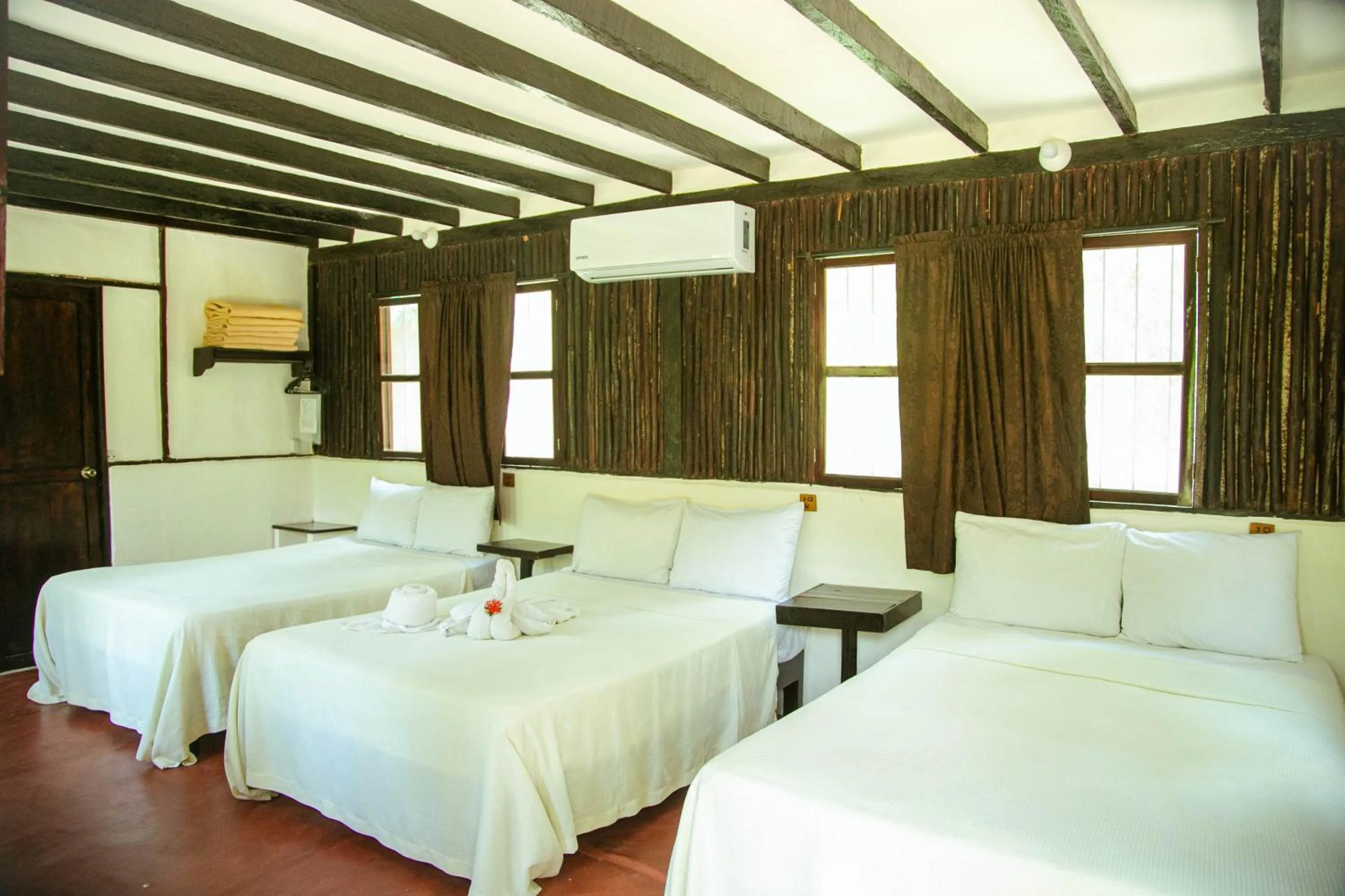 Bed in Cabañas Kin Balam Palenque