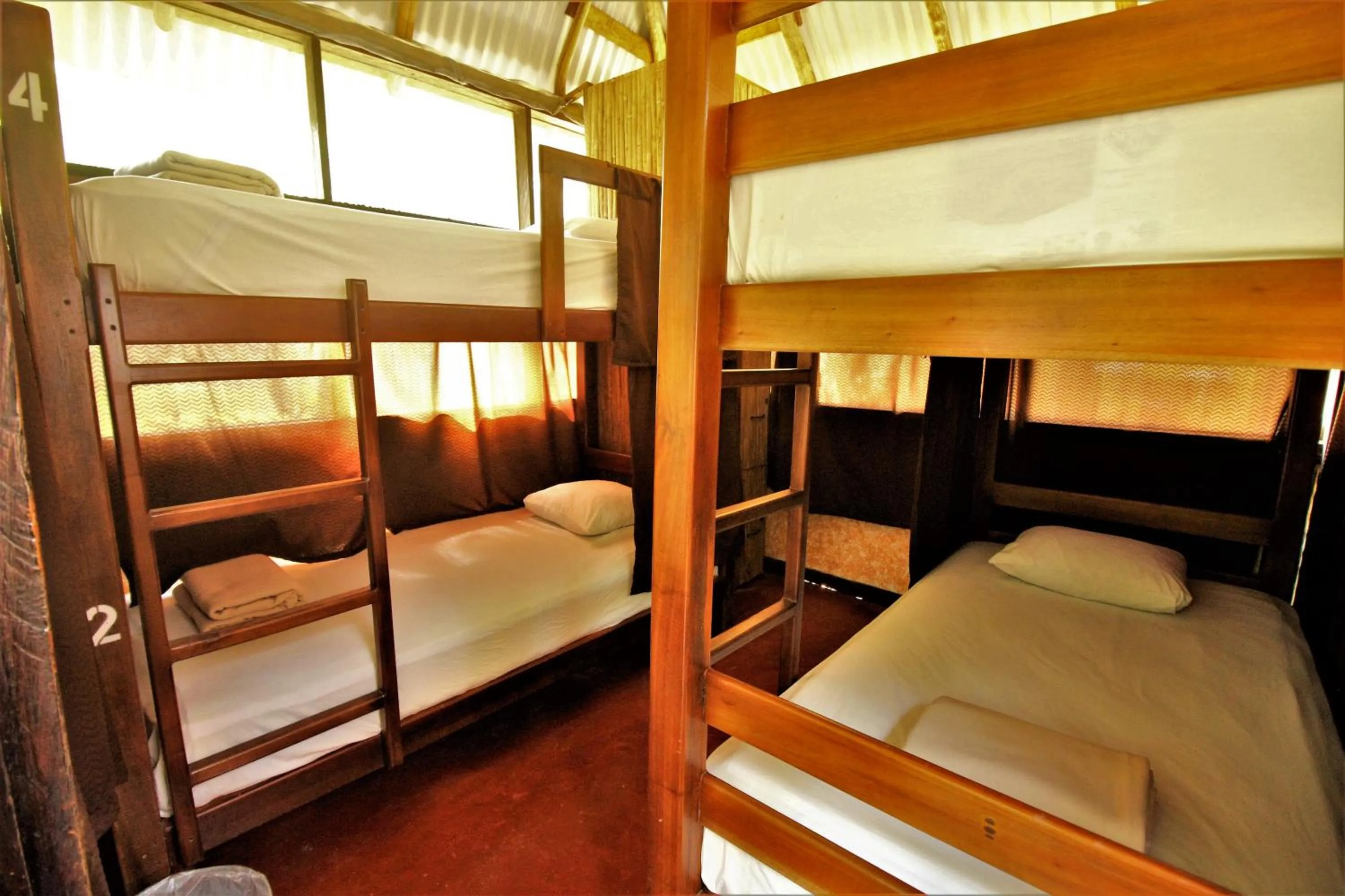 Bed in Cabañas Kin Balam Palenque