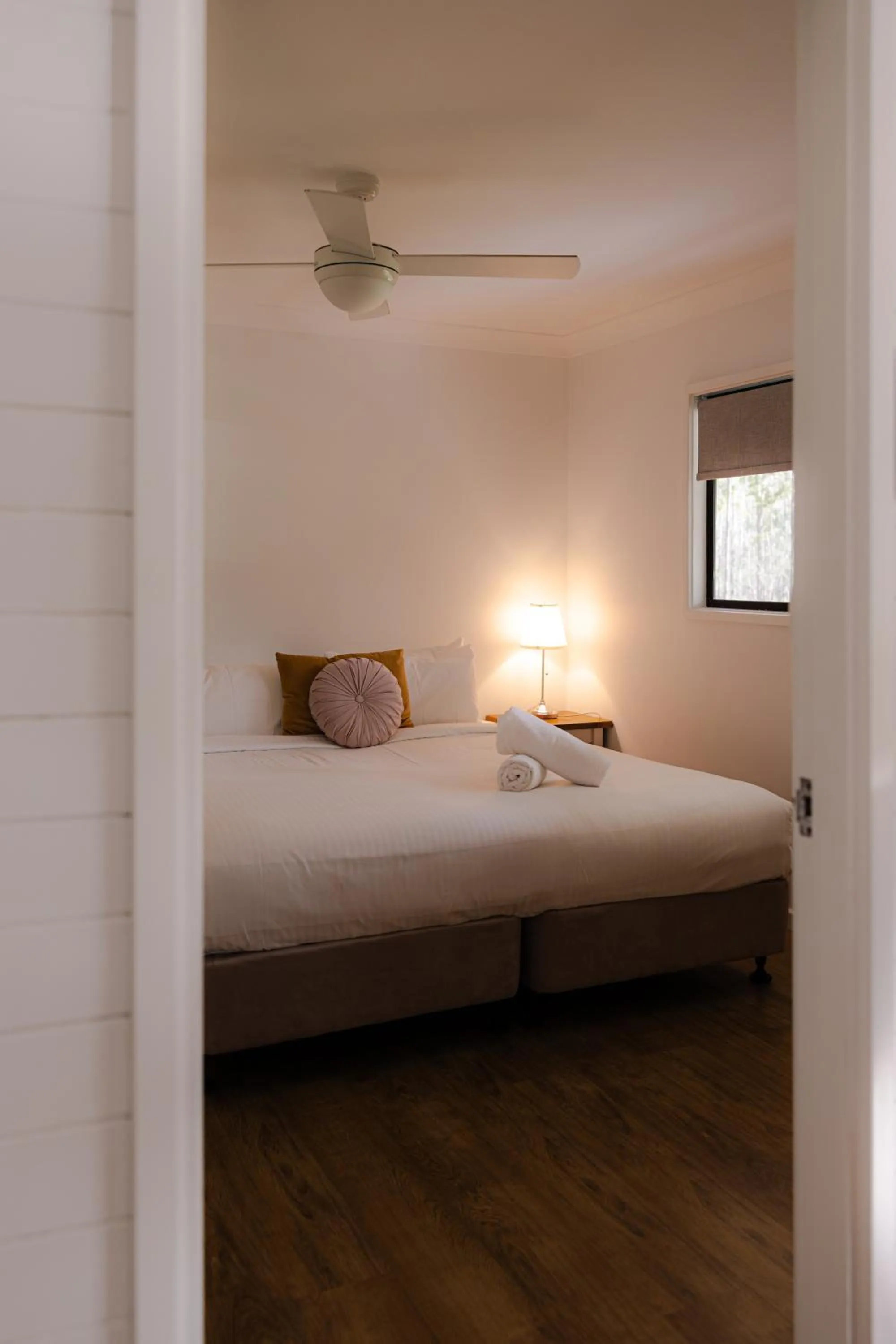 Bed in Pokolbin Cottages