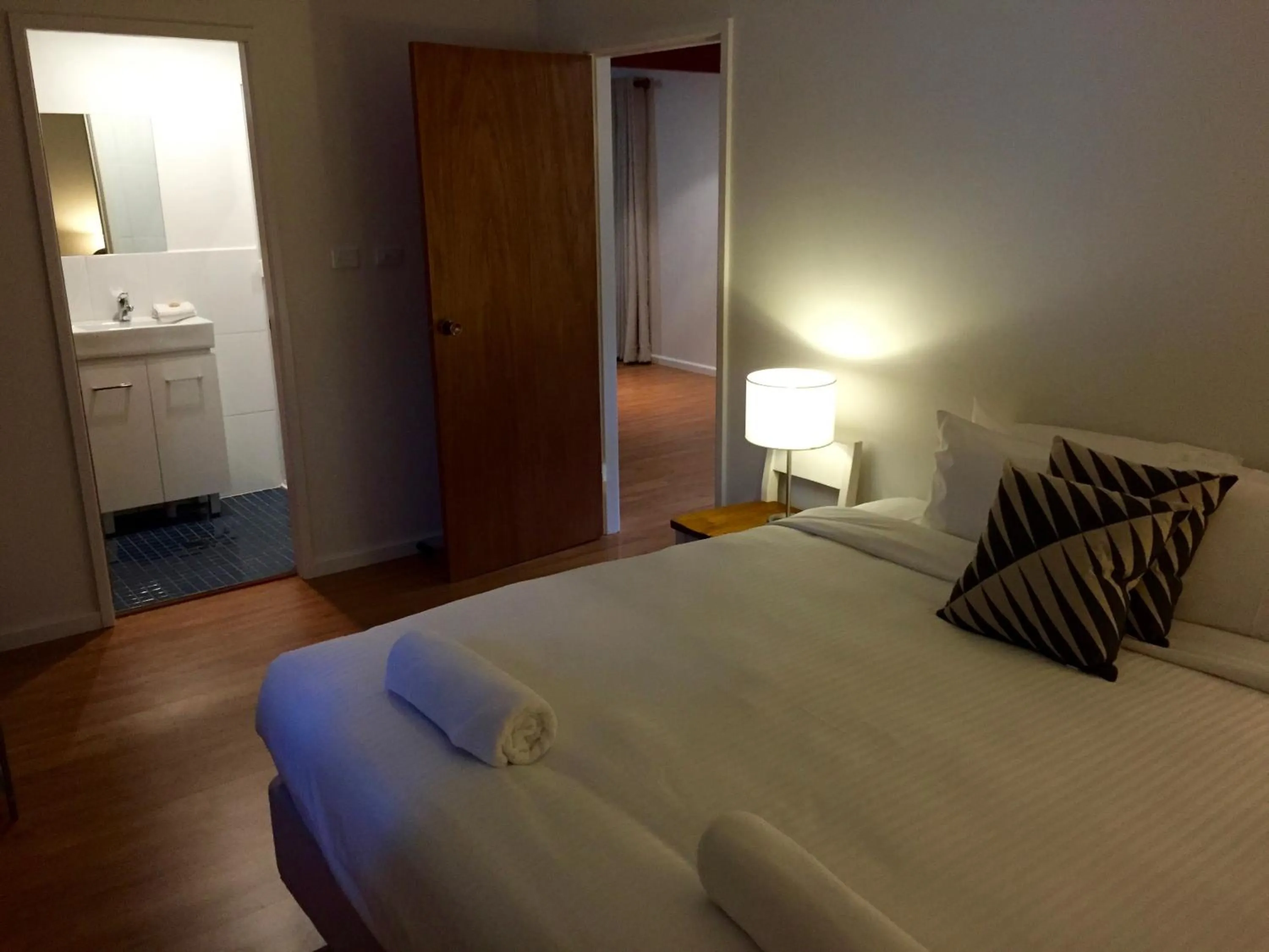 Bed in Pokolbin Cottages