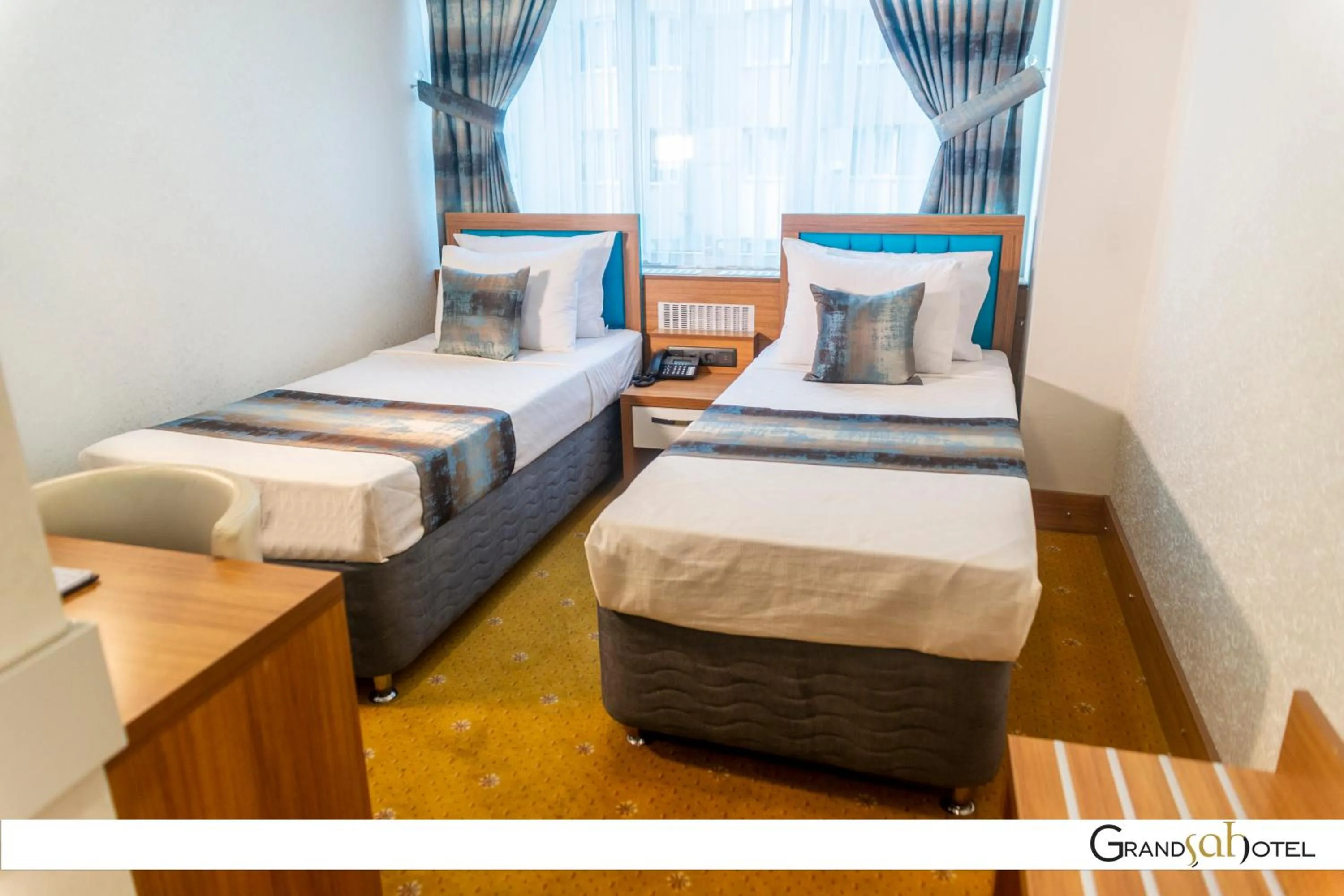 Bed in GRAND ŞAH OTEL