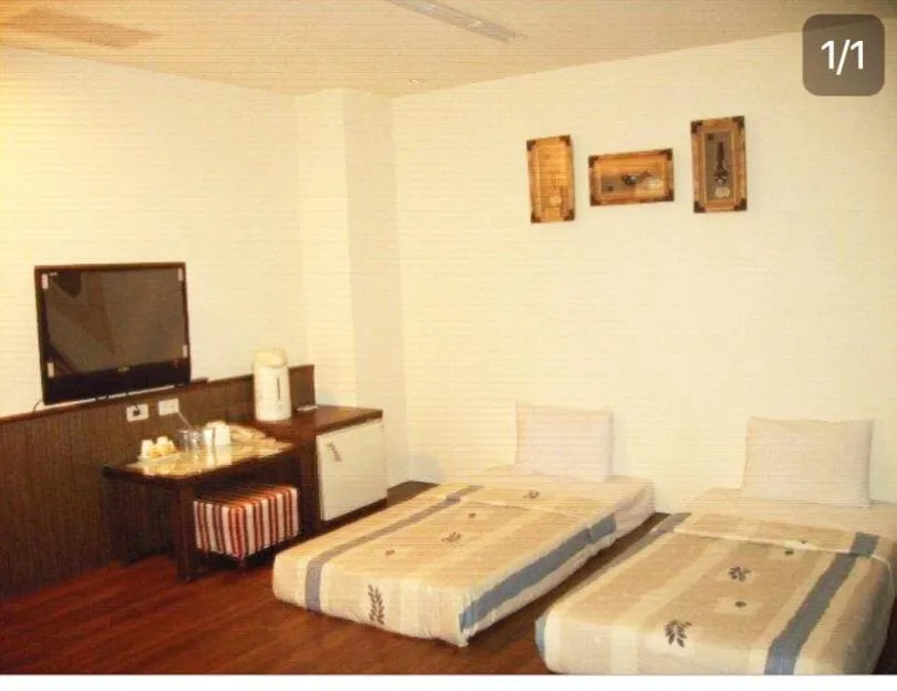 Bed in Good Ground Hotel Tainan