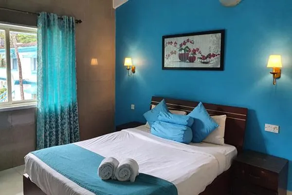 Bedroom, Bed in Paradise Village Beach Resort