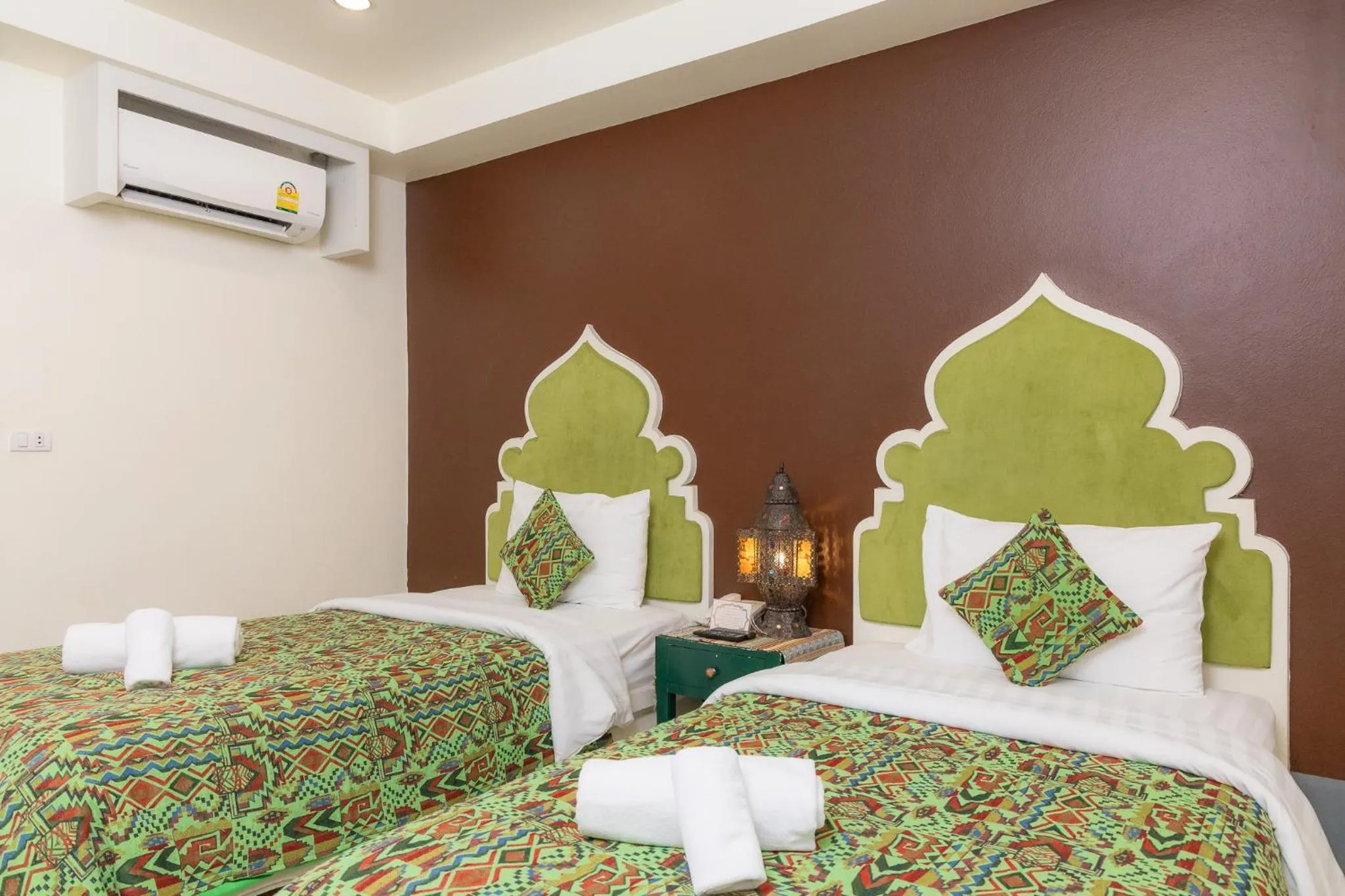 Bed in Rasa Boutique Hotel Chiang Rai