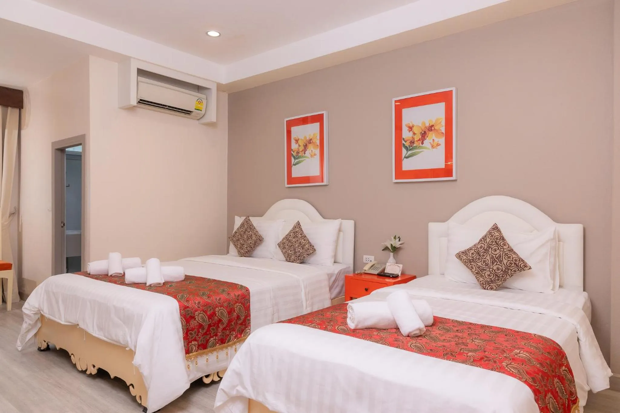 Bed in Rasa Boutique Hotel Chiang Rai