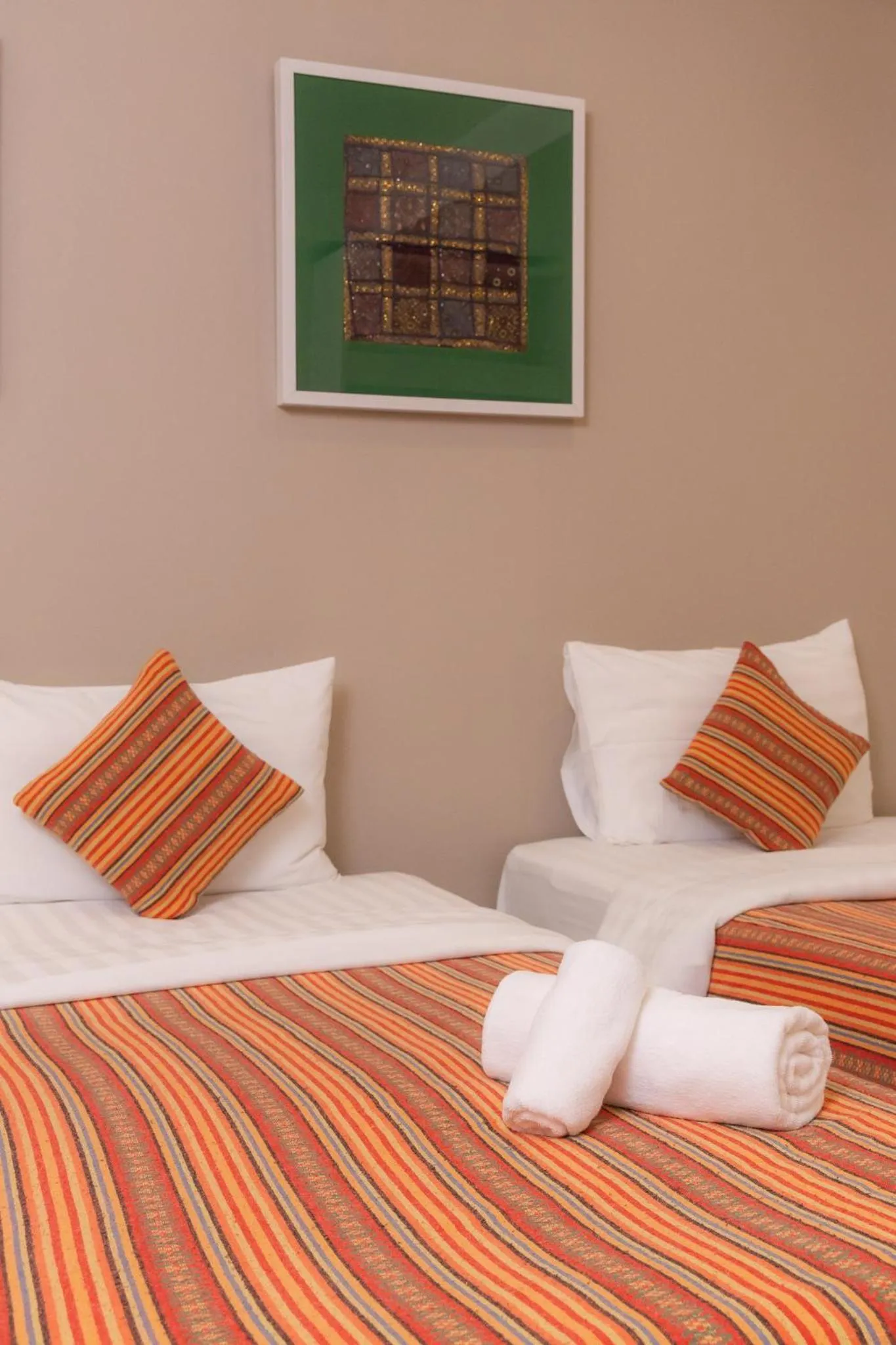 Bed in Rasa Boutique Hotel Chiang Rai