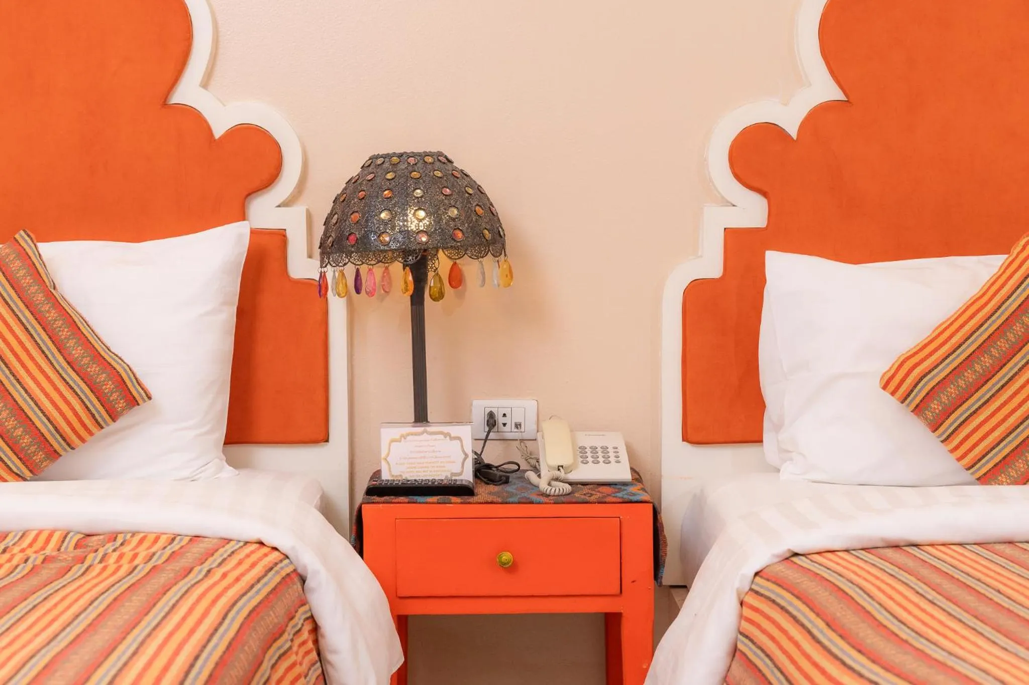 Bed in Rasa Boutique Hotel Chiang Rai