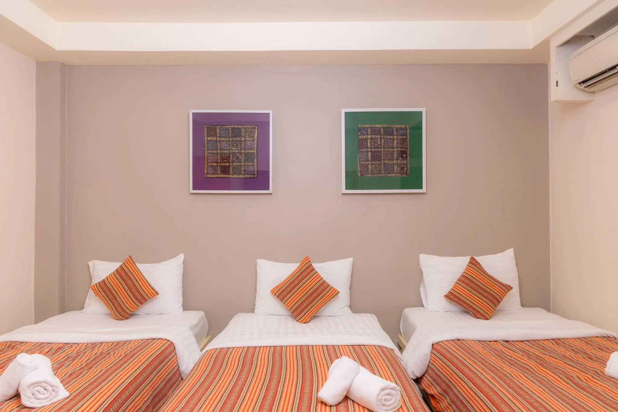 Bed in Rasa Boutique Hotel Chiang Rai