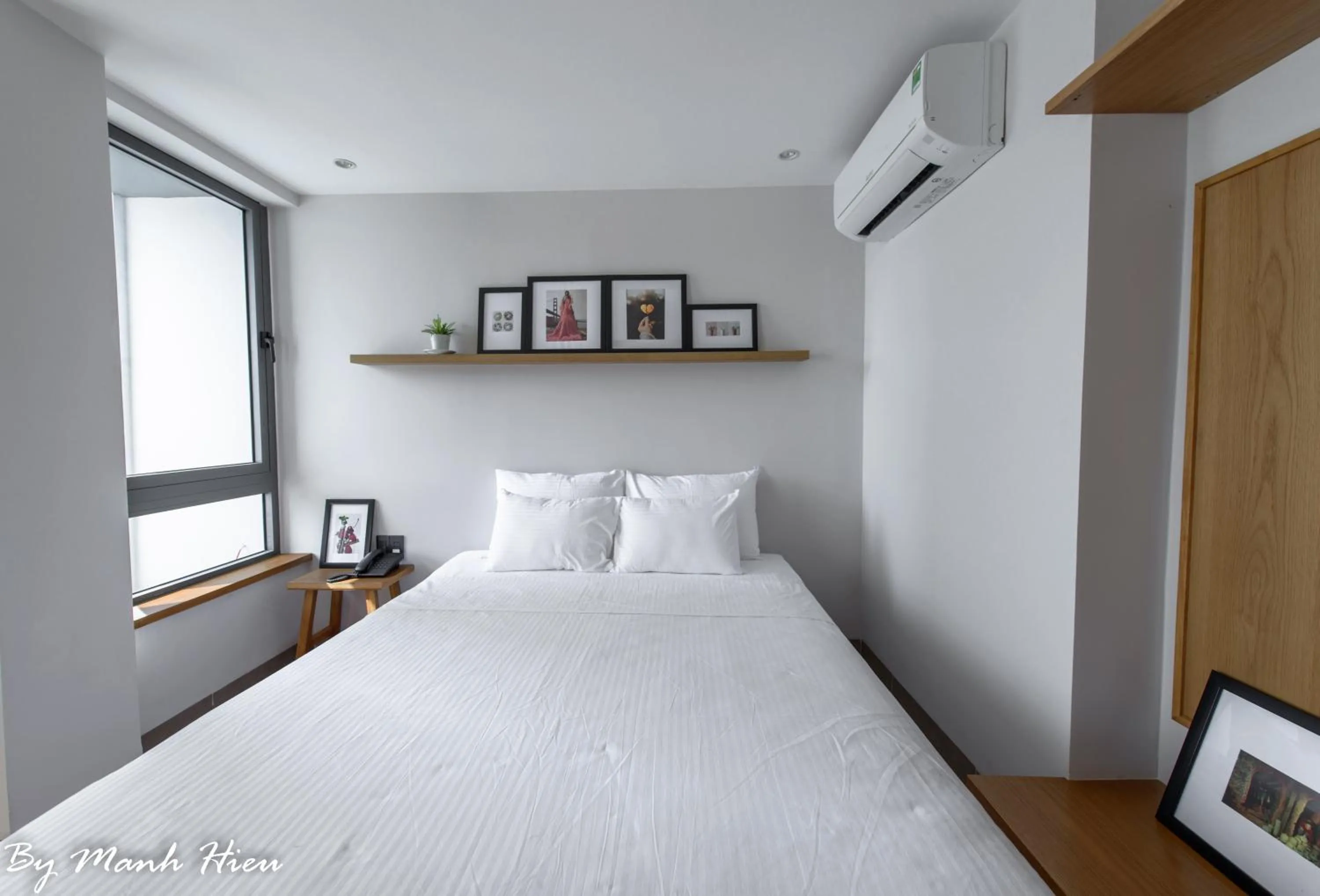 Bed in Mojzo Inn Boutique Hotel