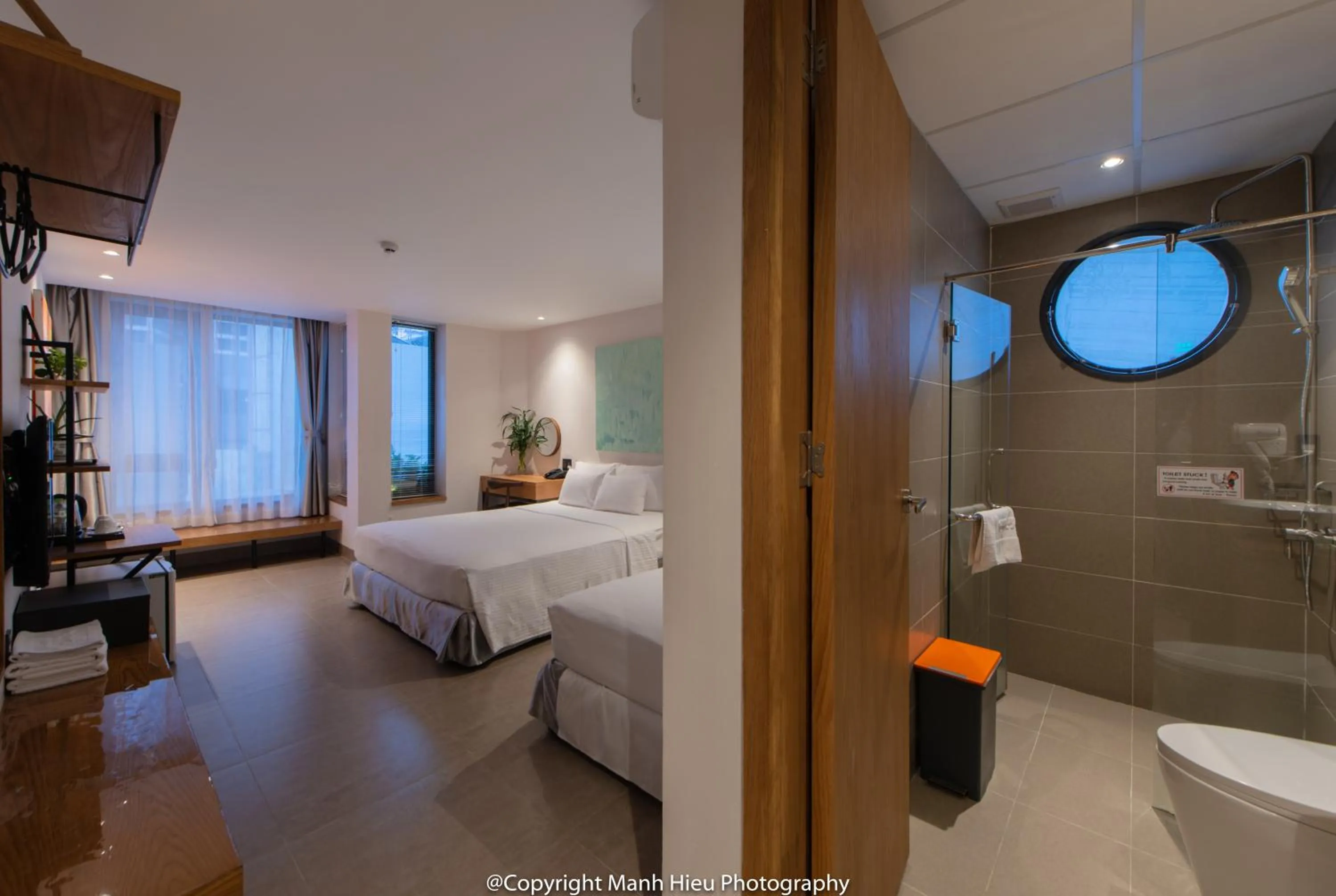 Bed in Mojzo Inn Boutique Hotel