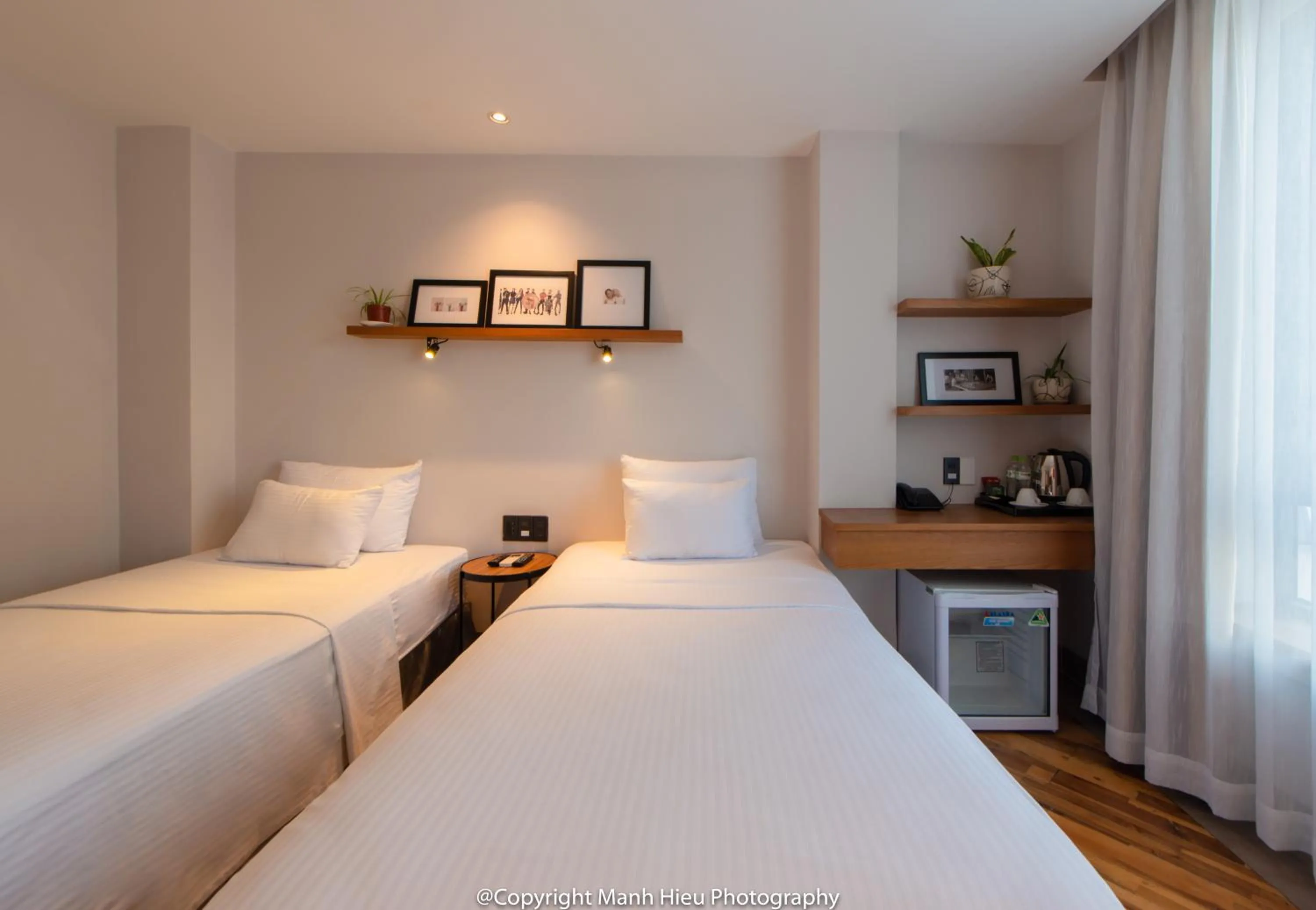 Bed in Mojzo Inn Boutique Hotel