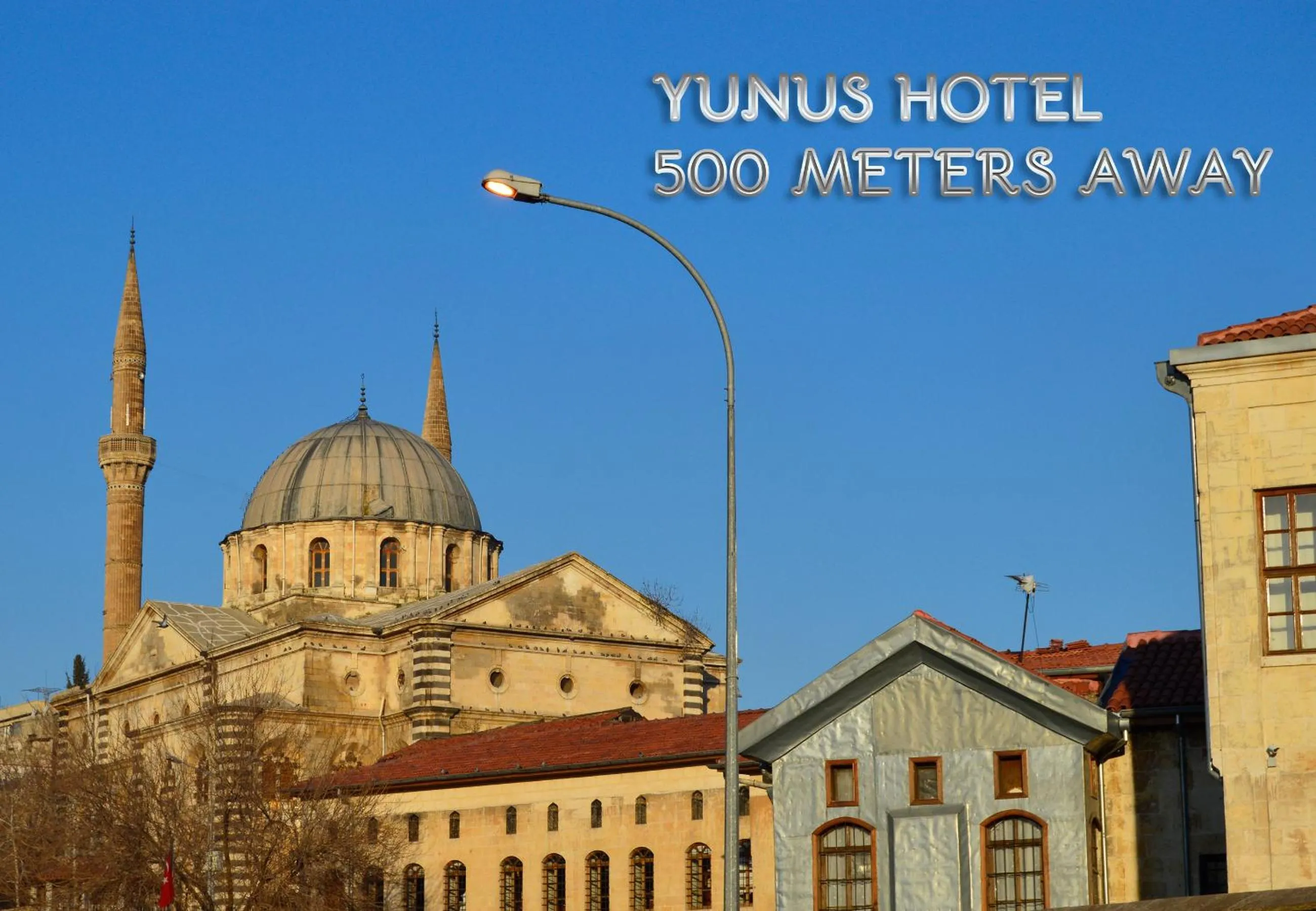 Property logo or sign in Yunus Hotel