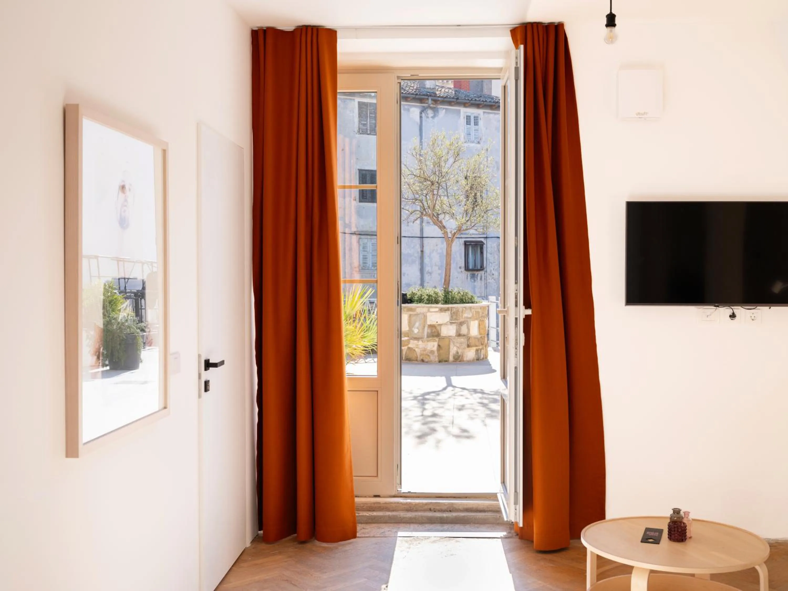 Communal lounge/ TV room in Art Hotel Tartini