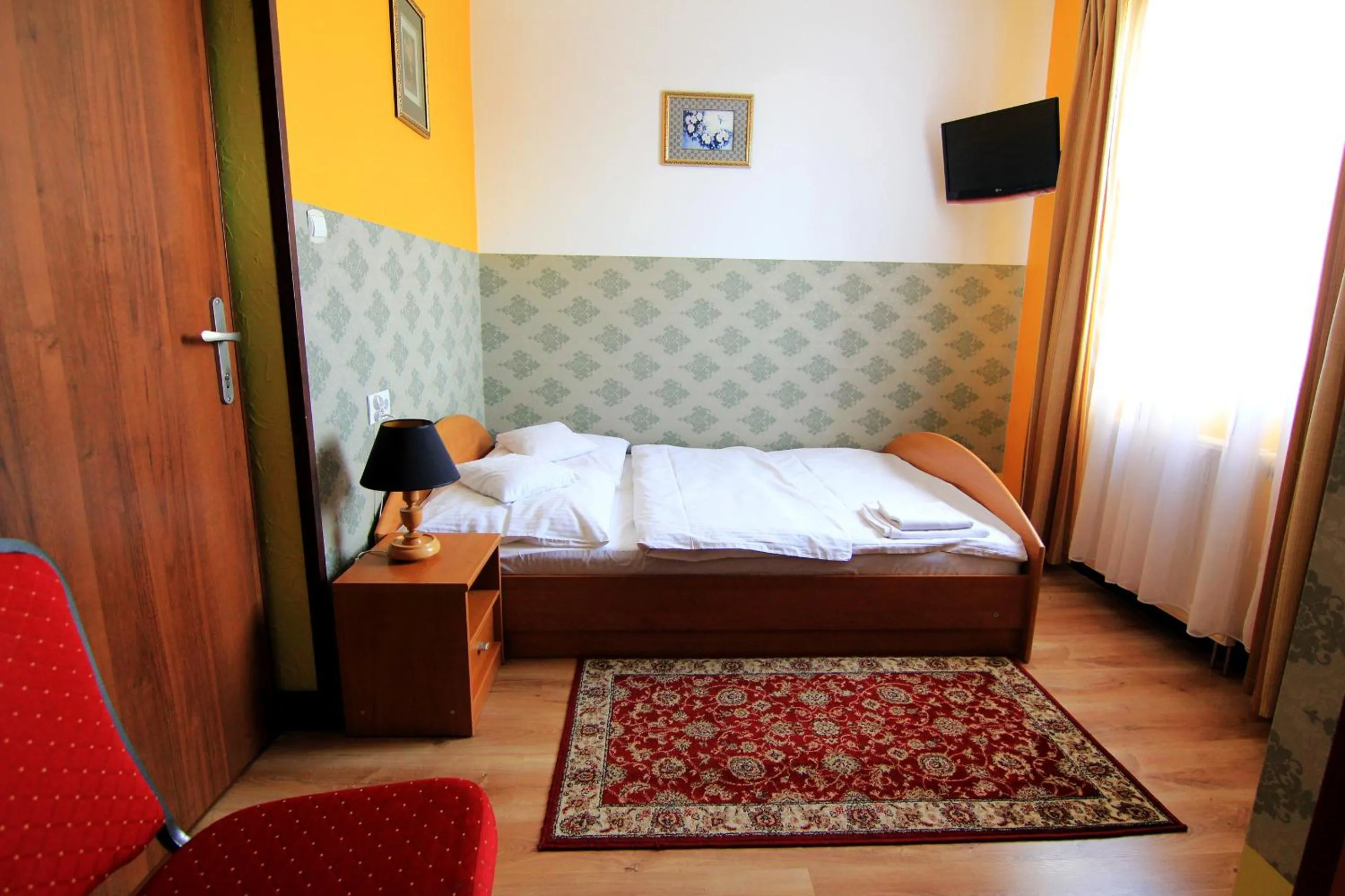 Bed in FusGym Resort