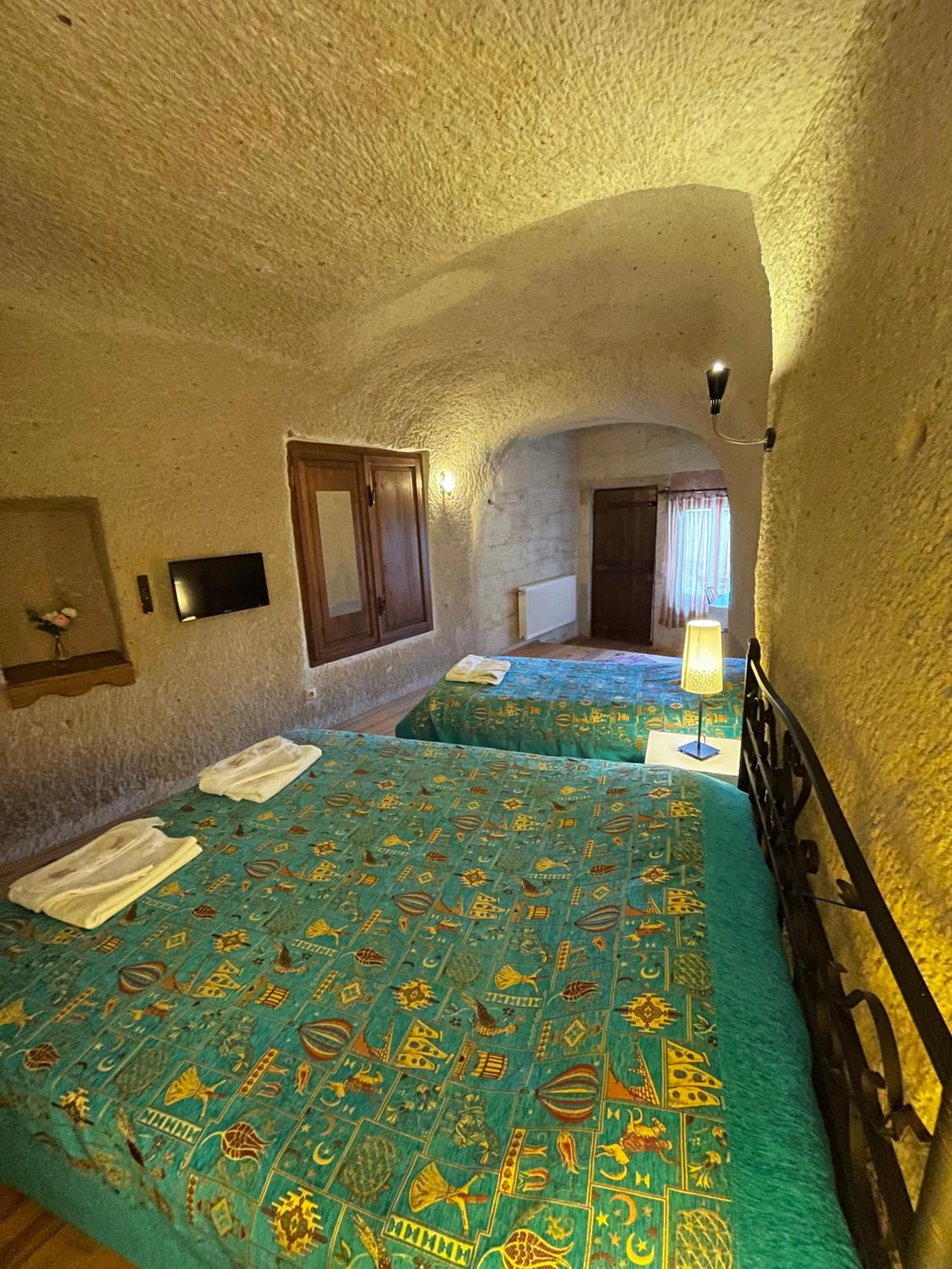 Bed in Karadut Cave Hotel