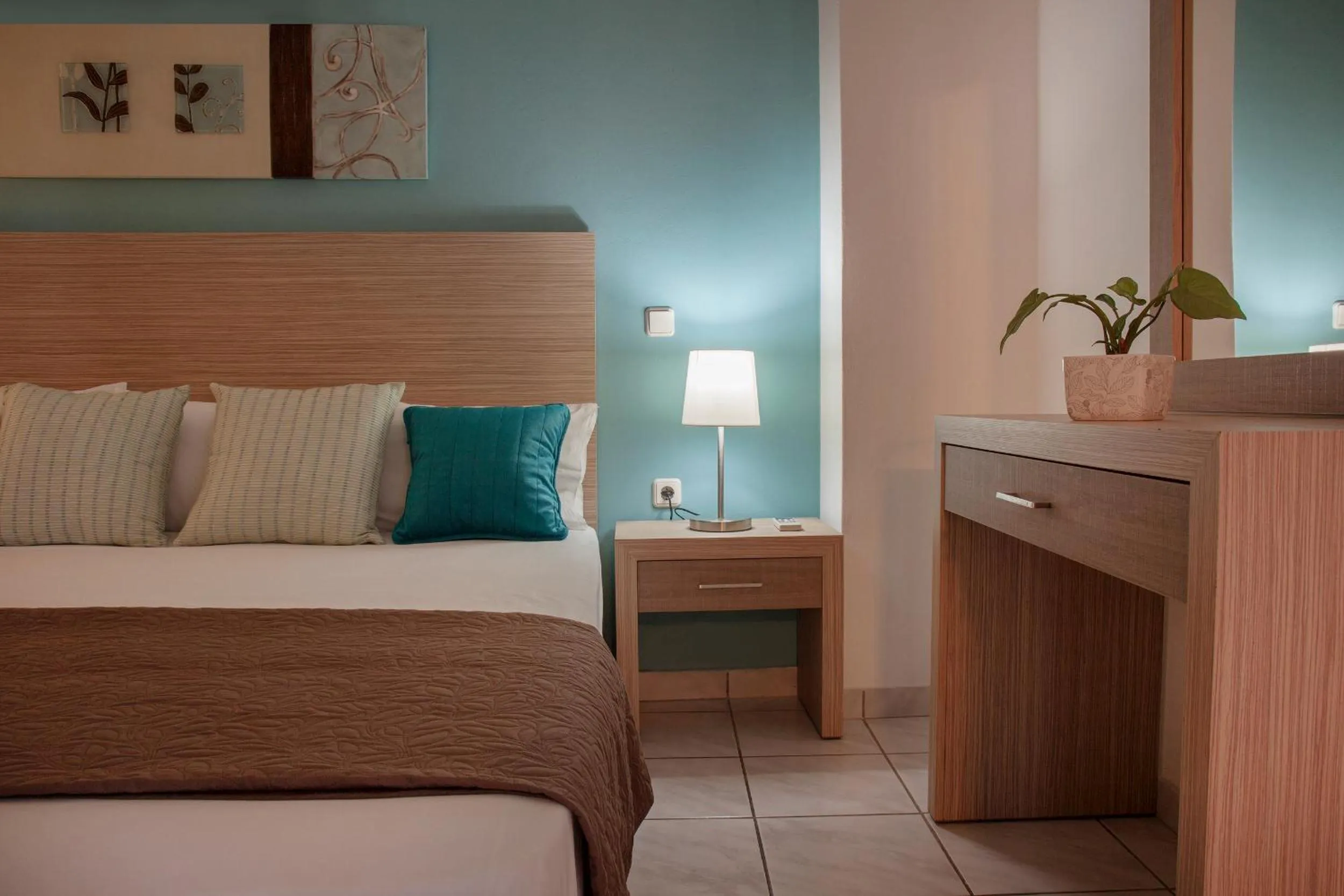 Bed in Minos Apartments & Studios