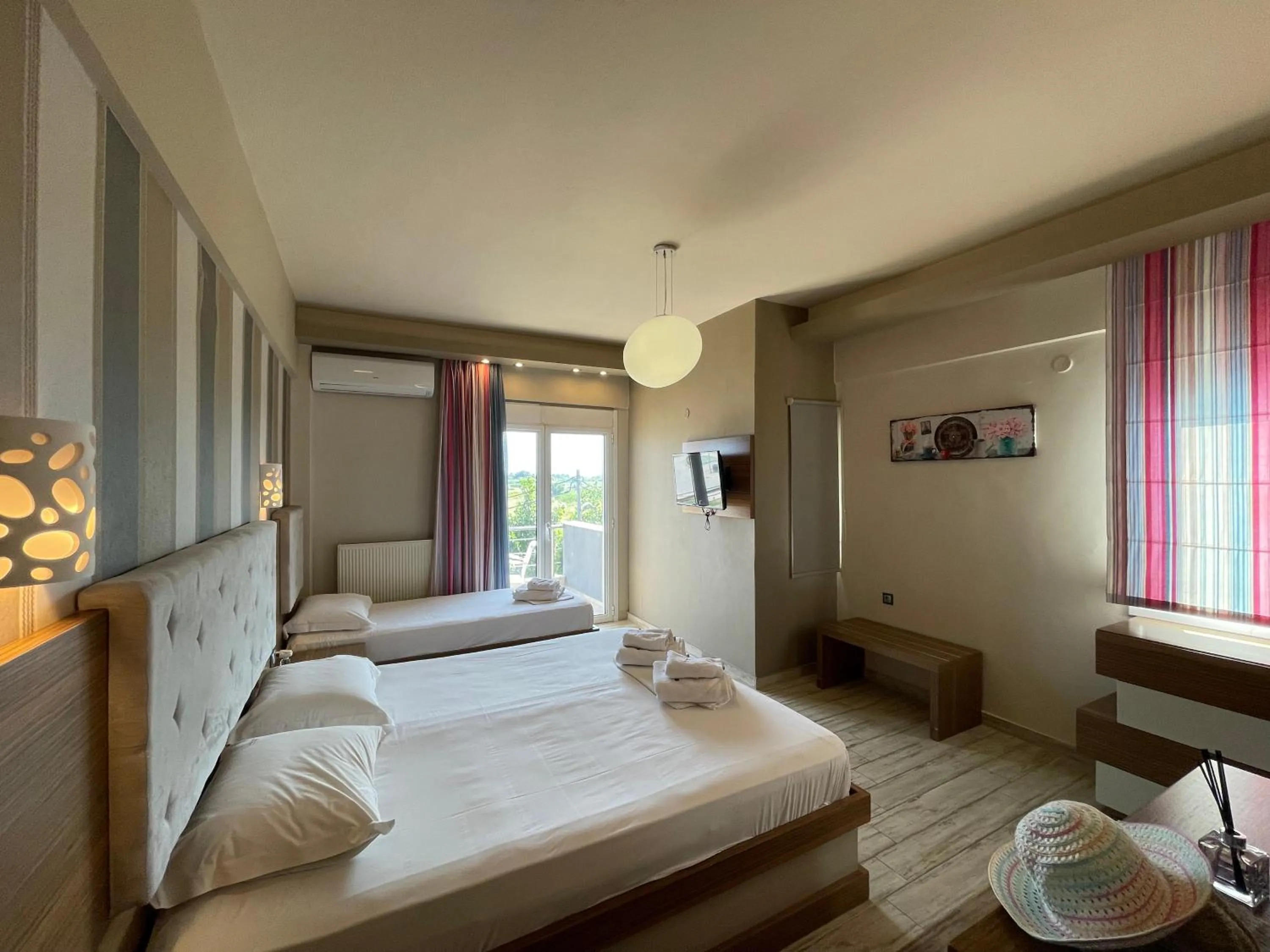 Bed in Porto Del Sol Hotel