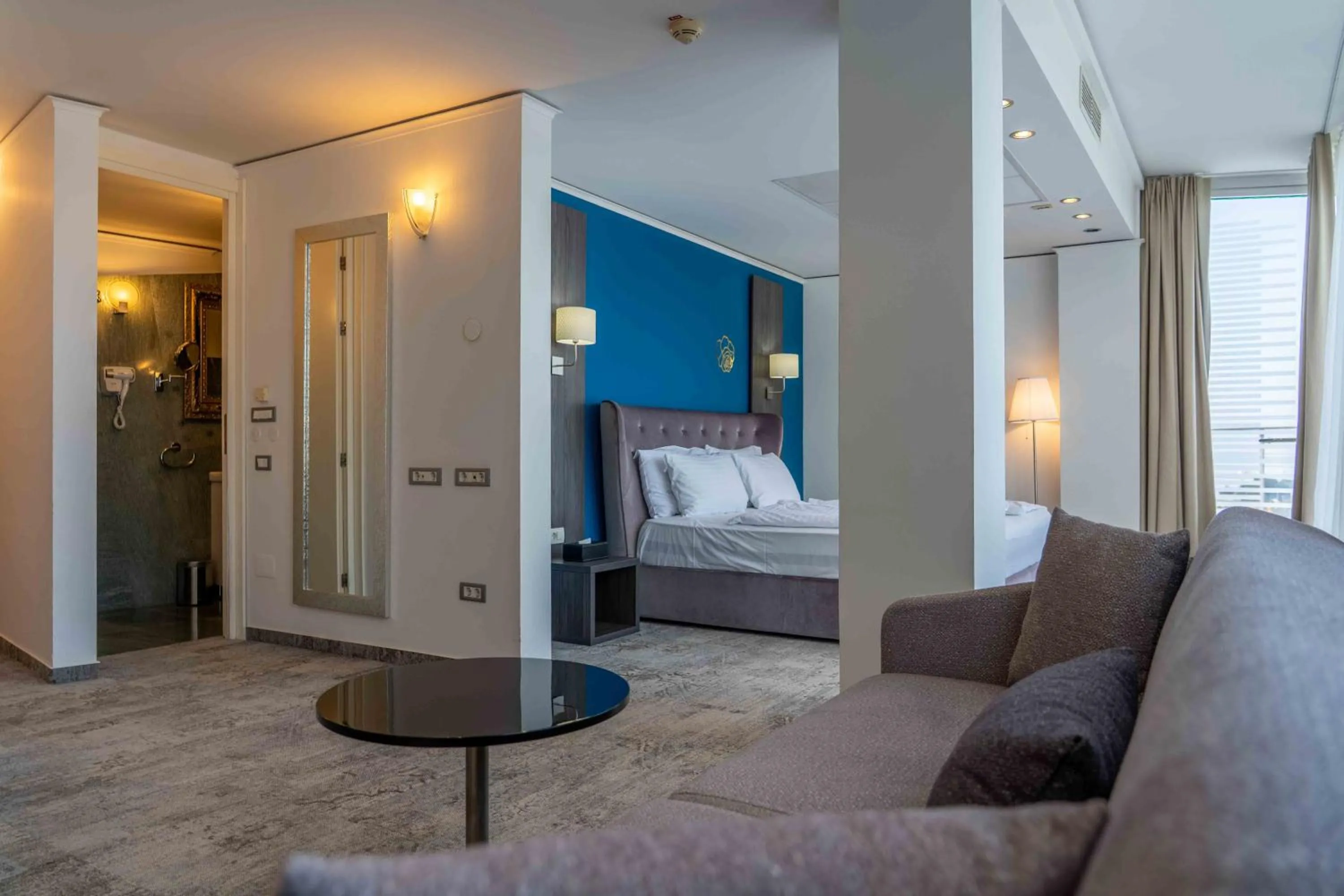 Seating area, Bed in Boutique Hotel Portorose