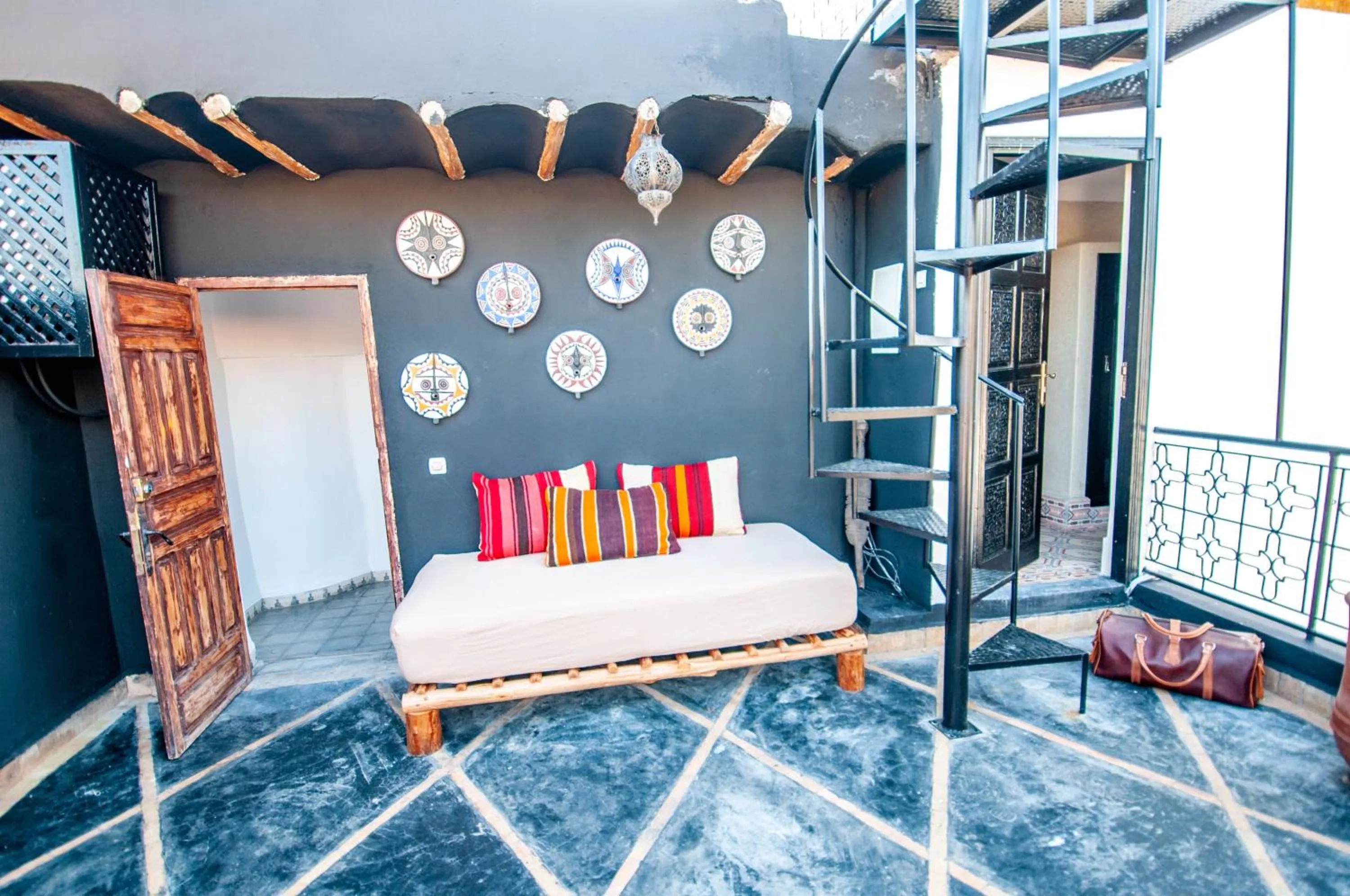 Seating area, Bed in Riad Makila