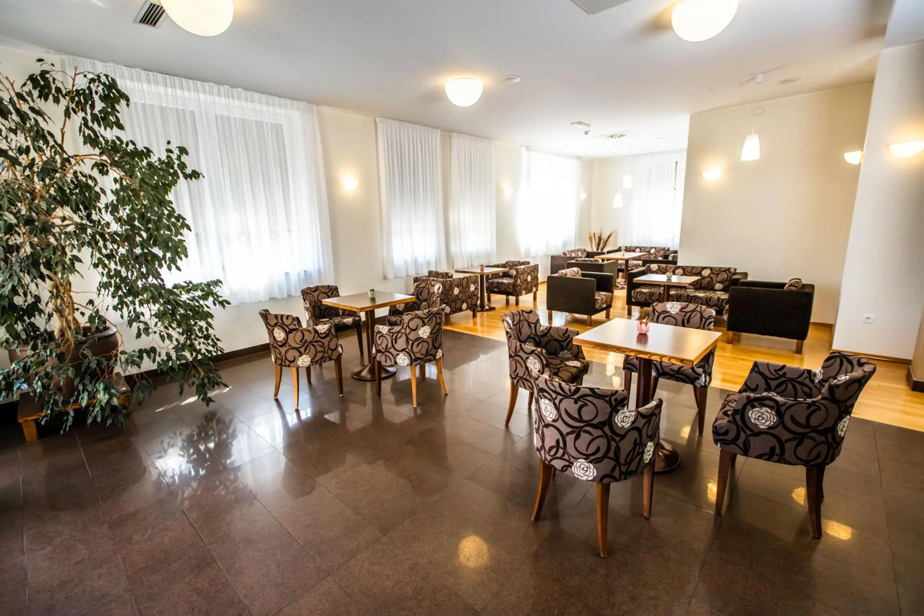 Lobby or reception in Hotel Bau Maribor