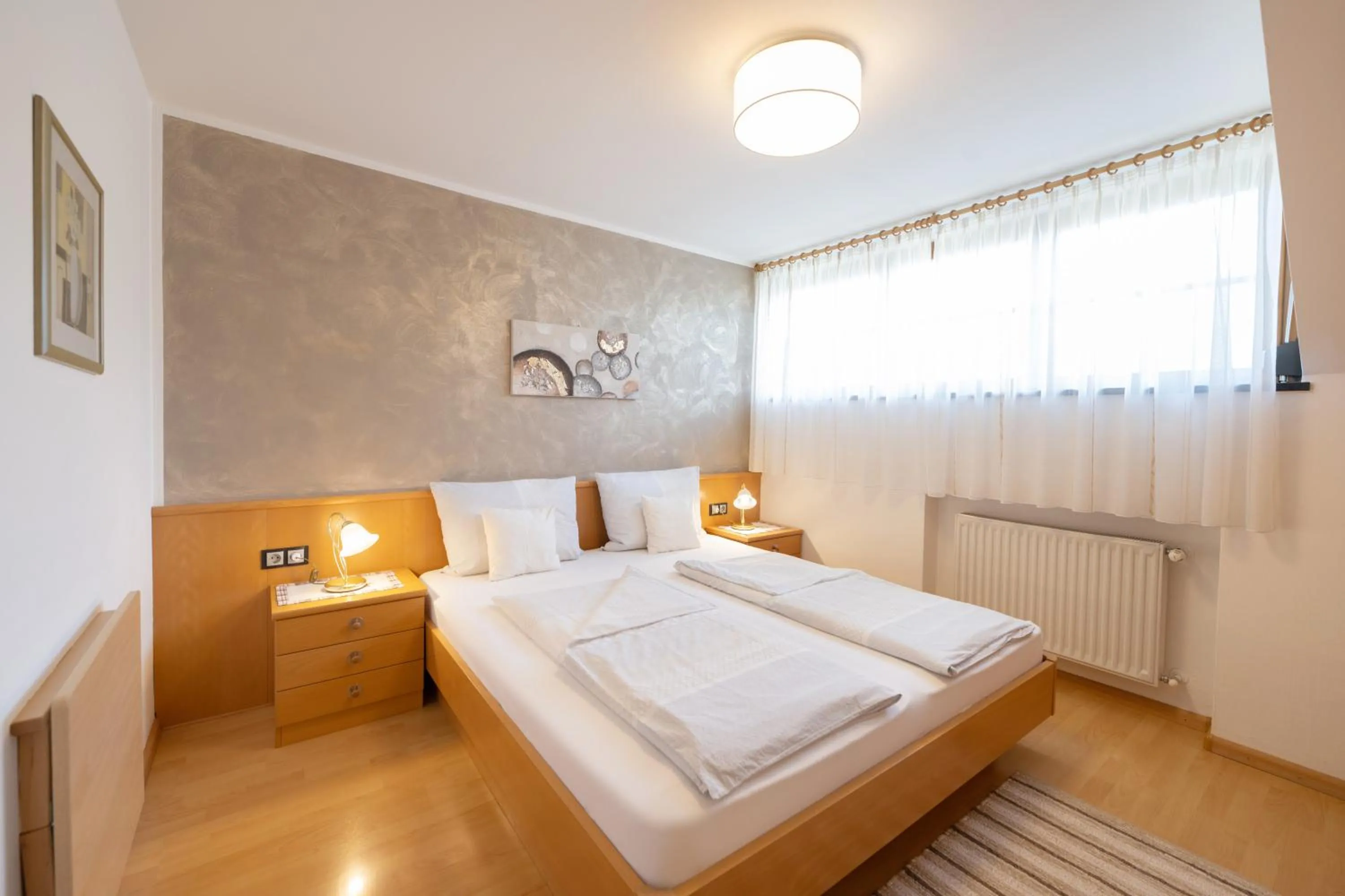 Bed in Ferienwohnungen Lanserhof