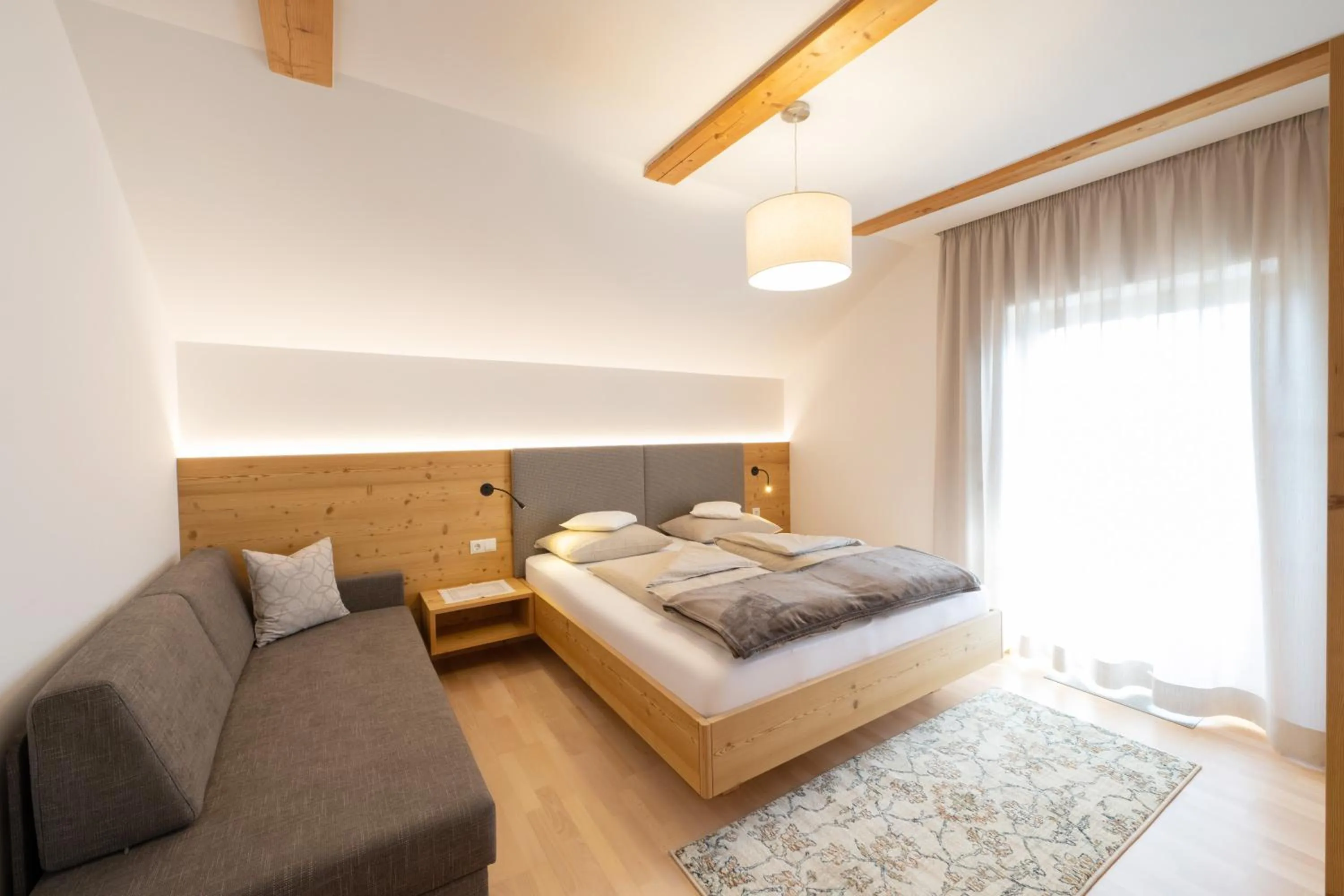 Bed in Ferienwohnungen Lanserhof