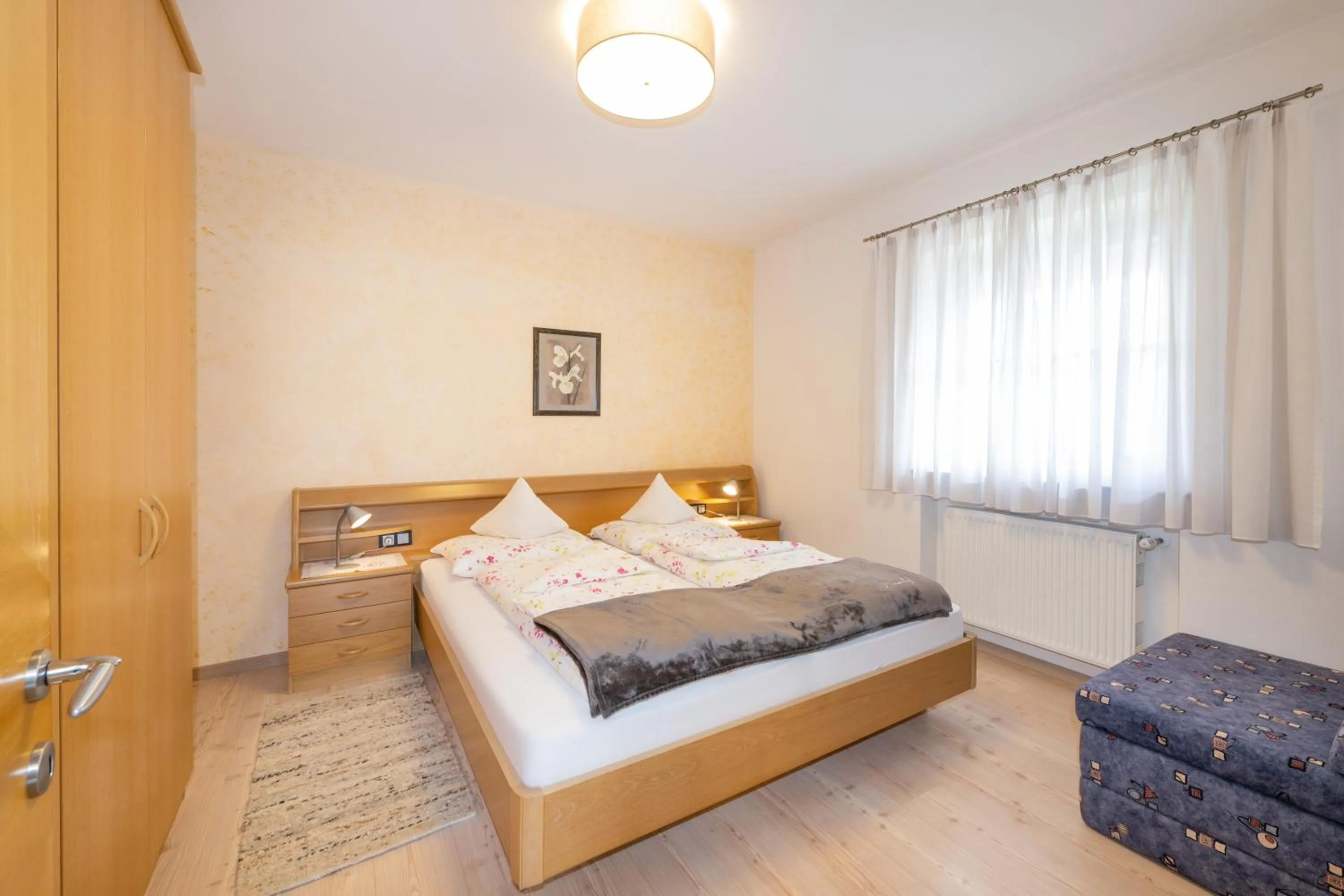 Bed in Ferienwohnungen Lanserhof