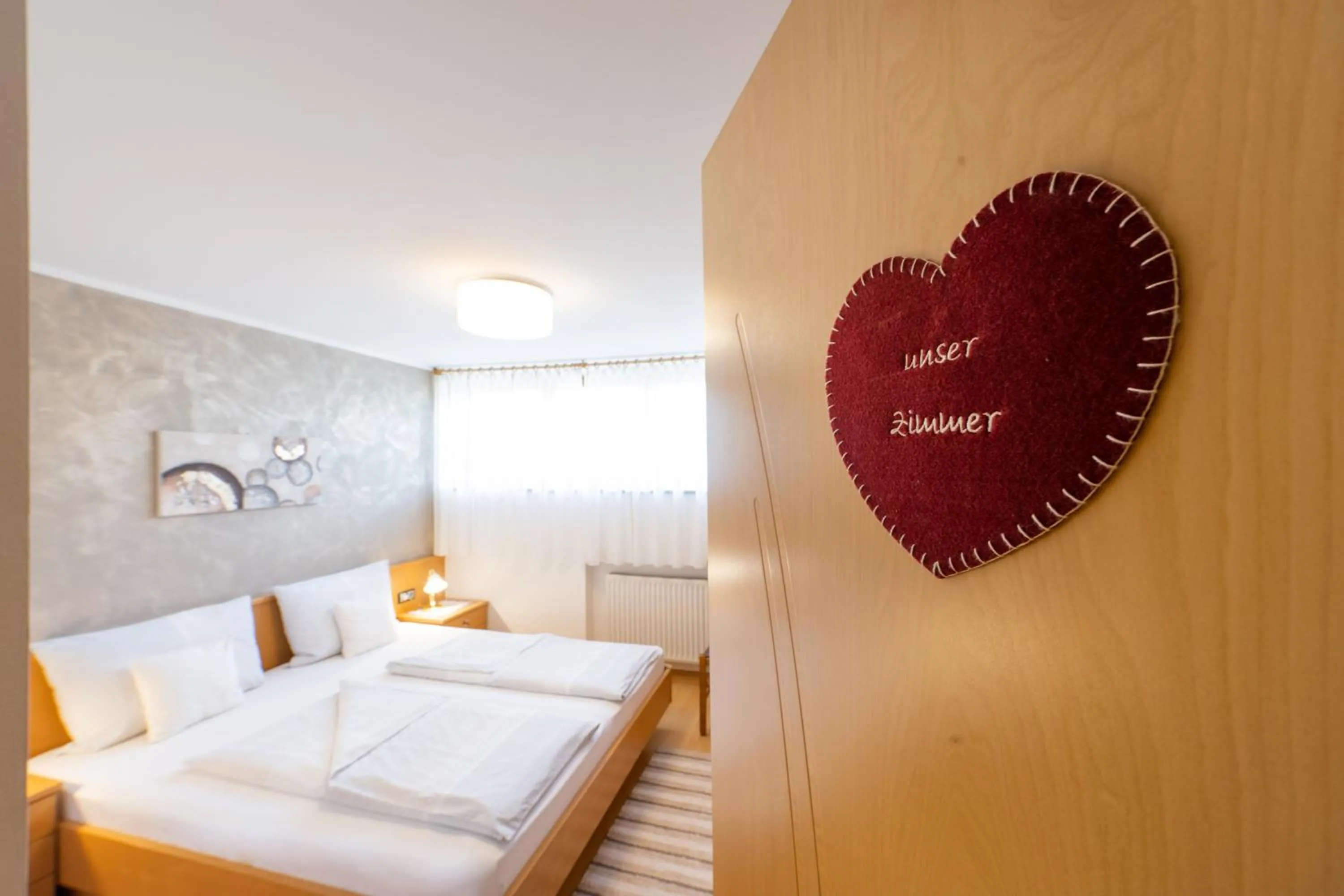 Bed in Ferienwohnungen Lanserhof