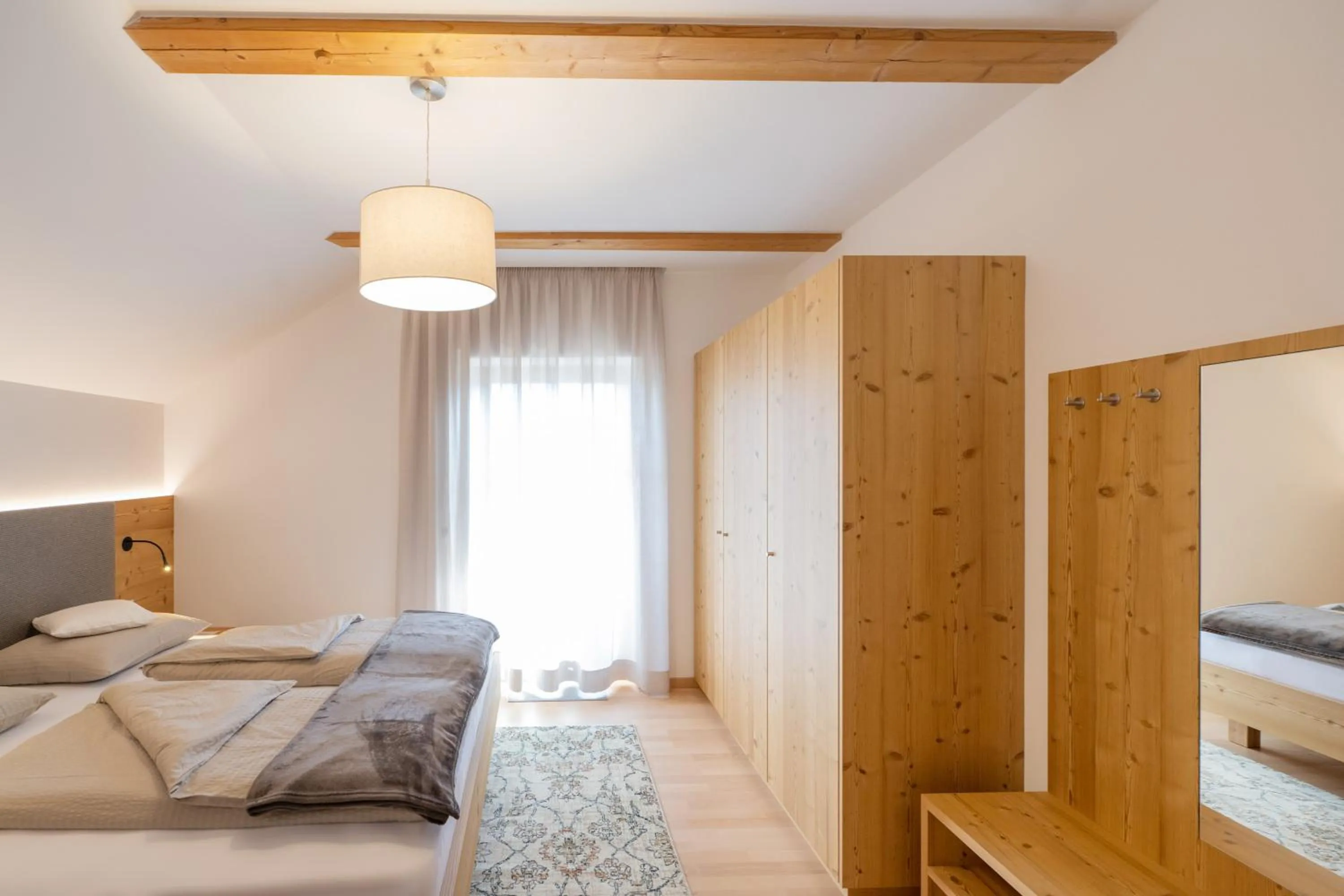 Bed in Ferienwohnungen Lanserhof