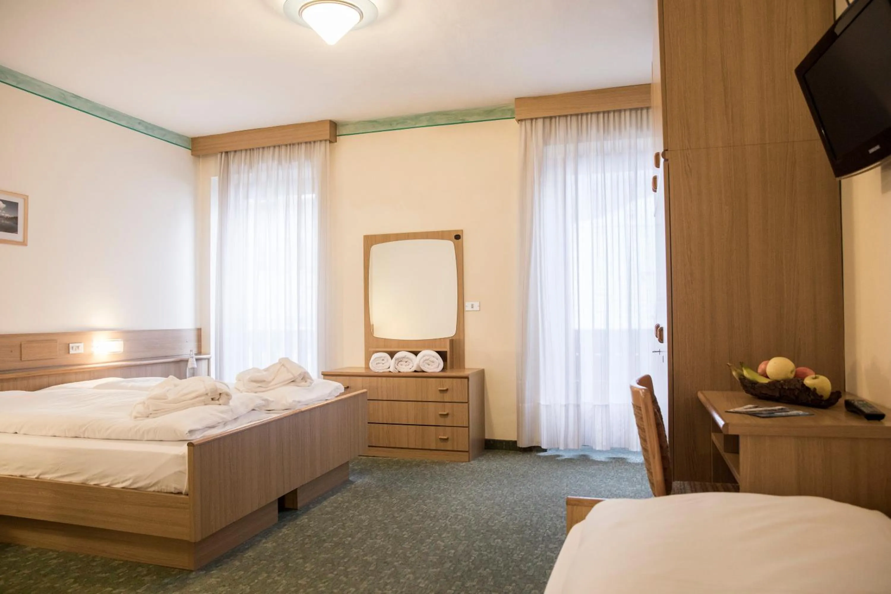 Bed in Active Hotel Rosat