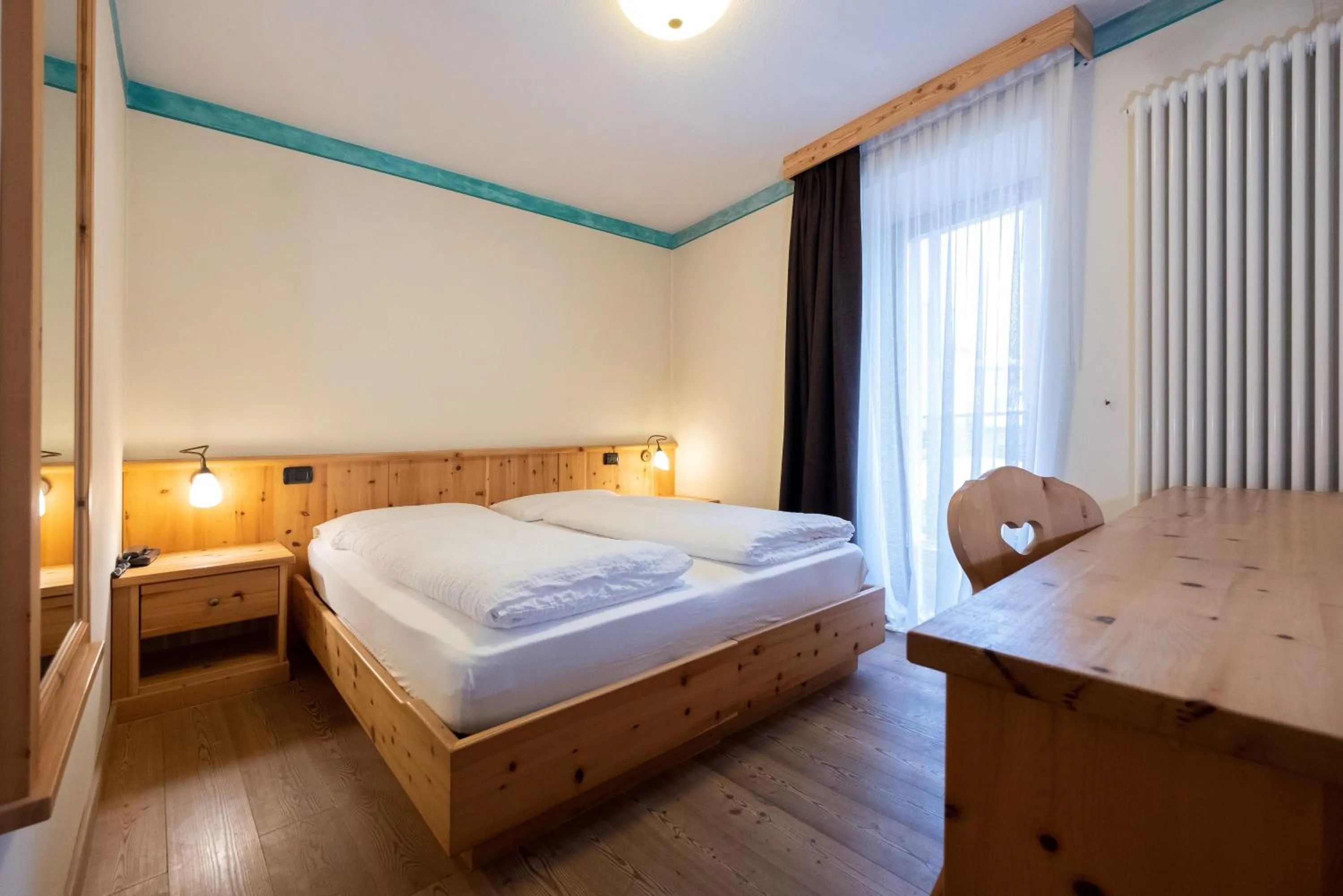 Bed in Active Hotel Rosat