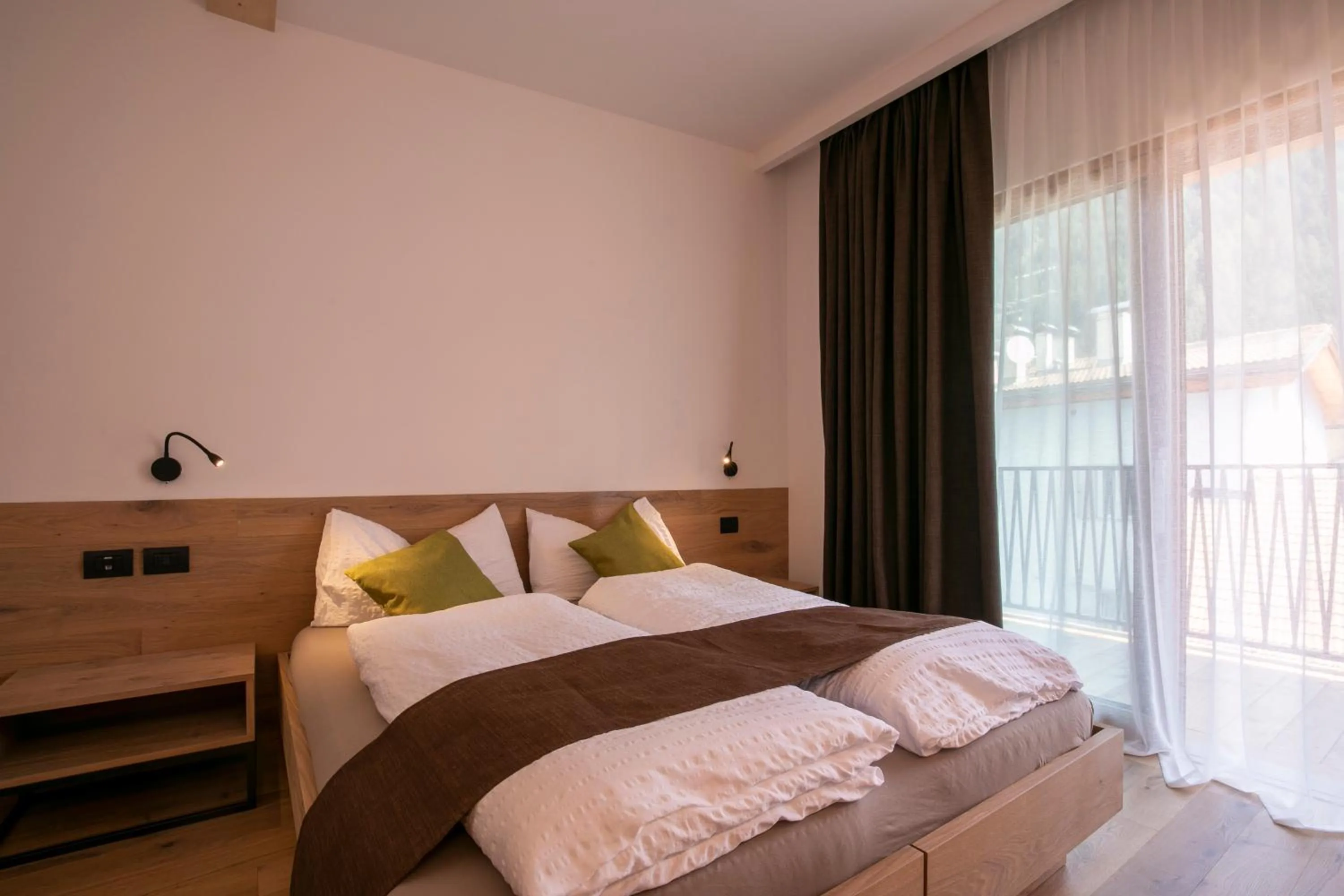 Bed in Active Hotel Rosat