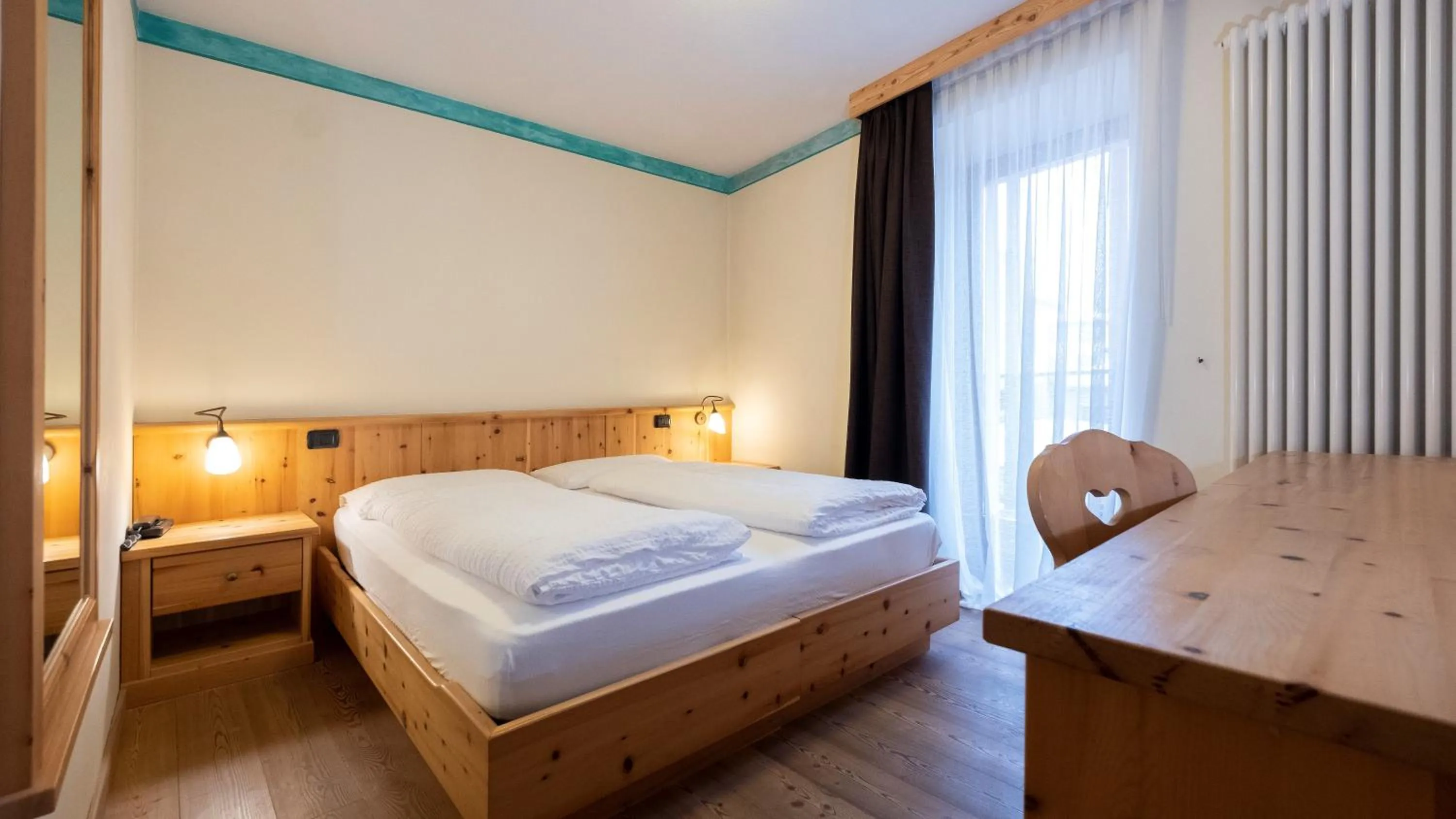 Bed in Active Hotel Rosat