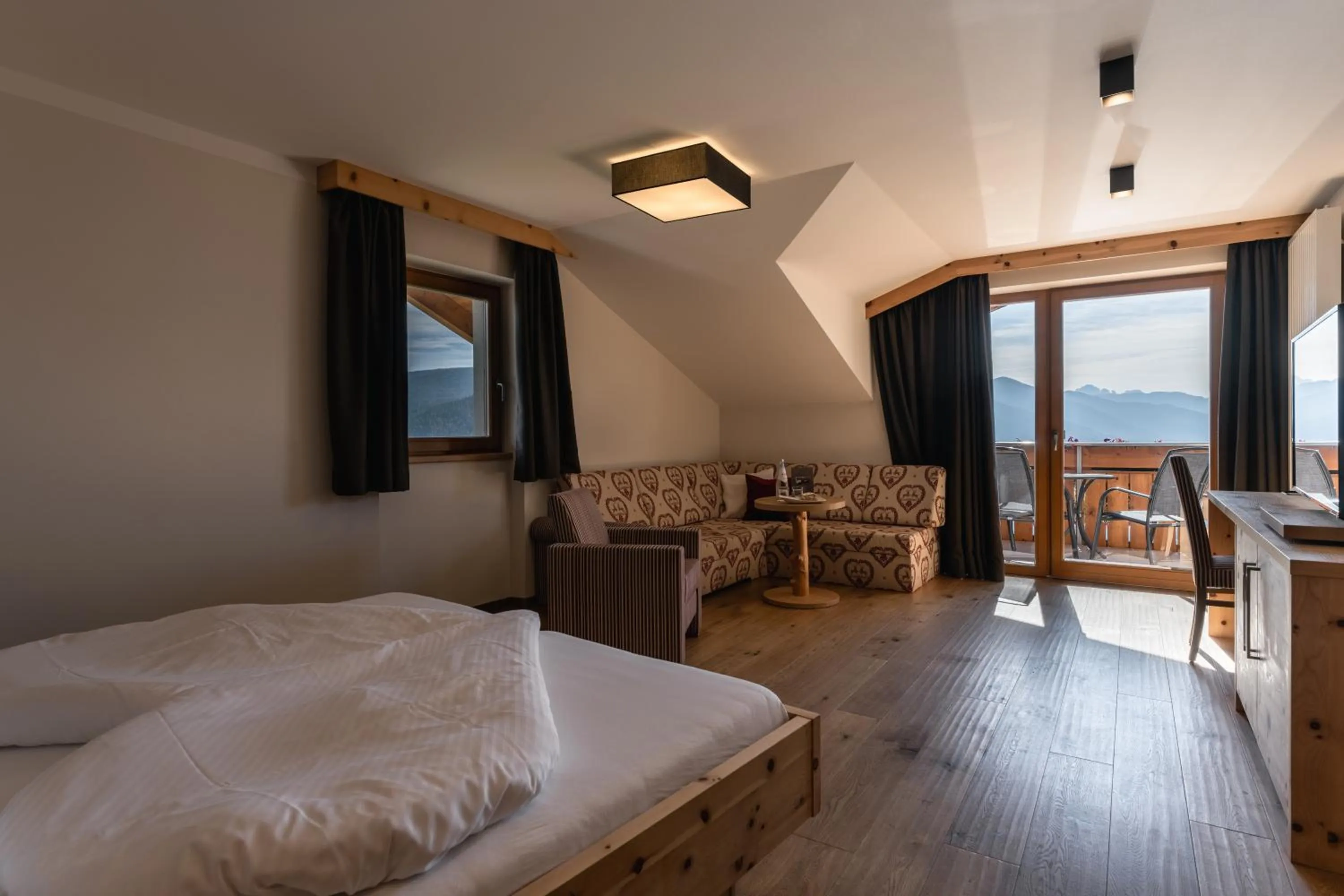 Photo of the whole room, Bed in Panoramahotel Huberhof