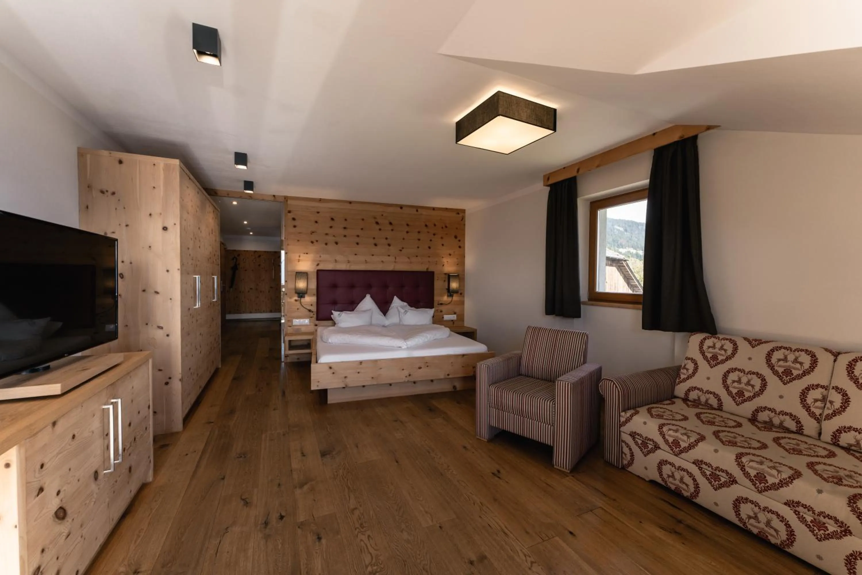 Photo of the whole room, Bed in Panoramahotel Huberhof